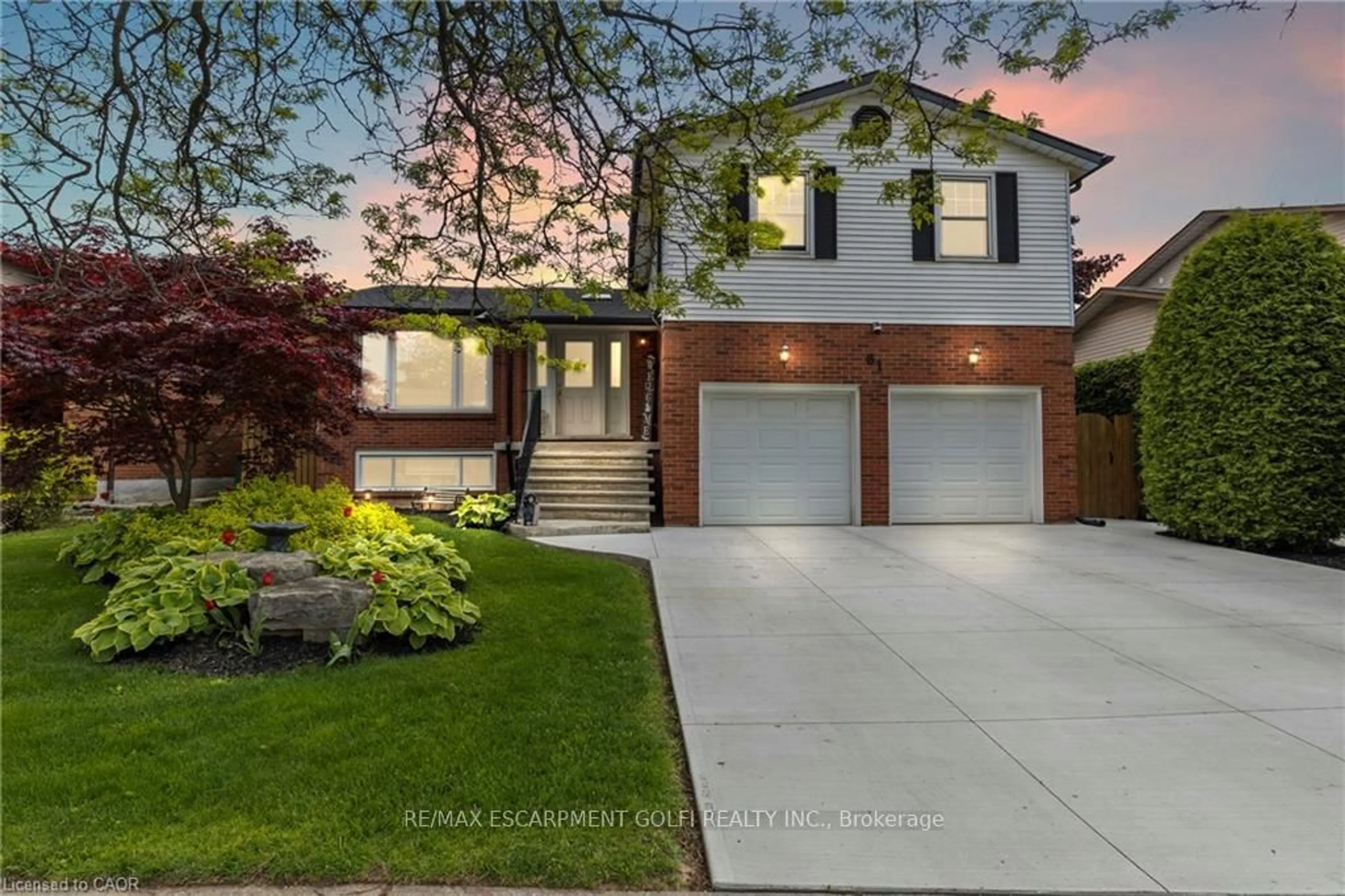 Home with brick exterior material, street for 61 Seaton Place Dr, Hamilton Ontario L8E 4A8