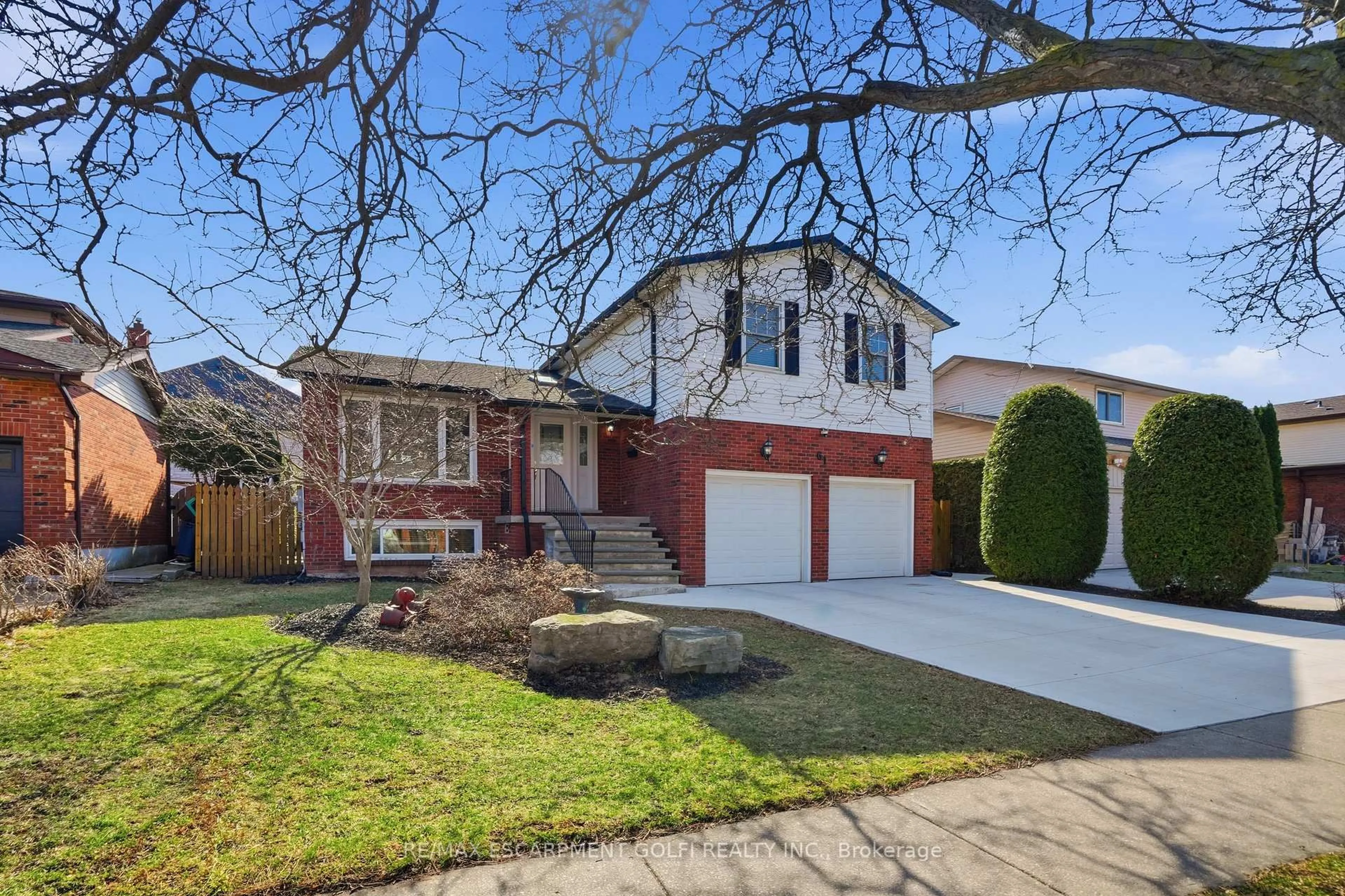 Home with brick exterior material, street for 61 Seaton Place Dr, Hamilton Ontario L8E 4A8