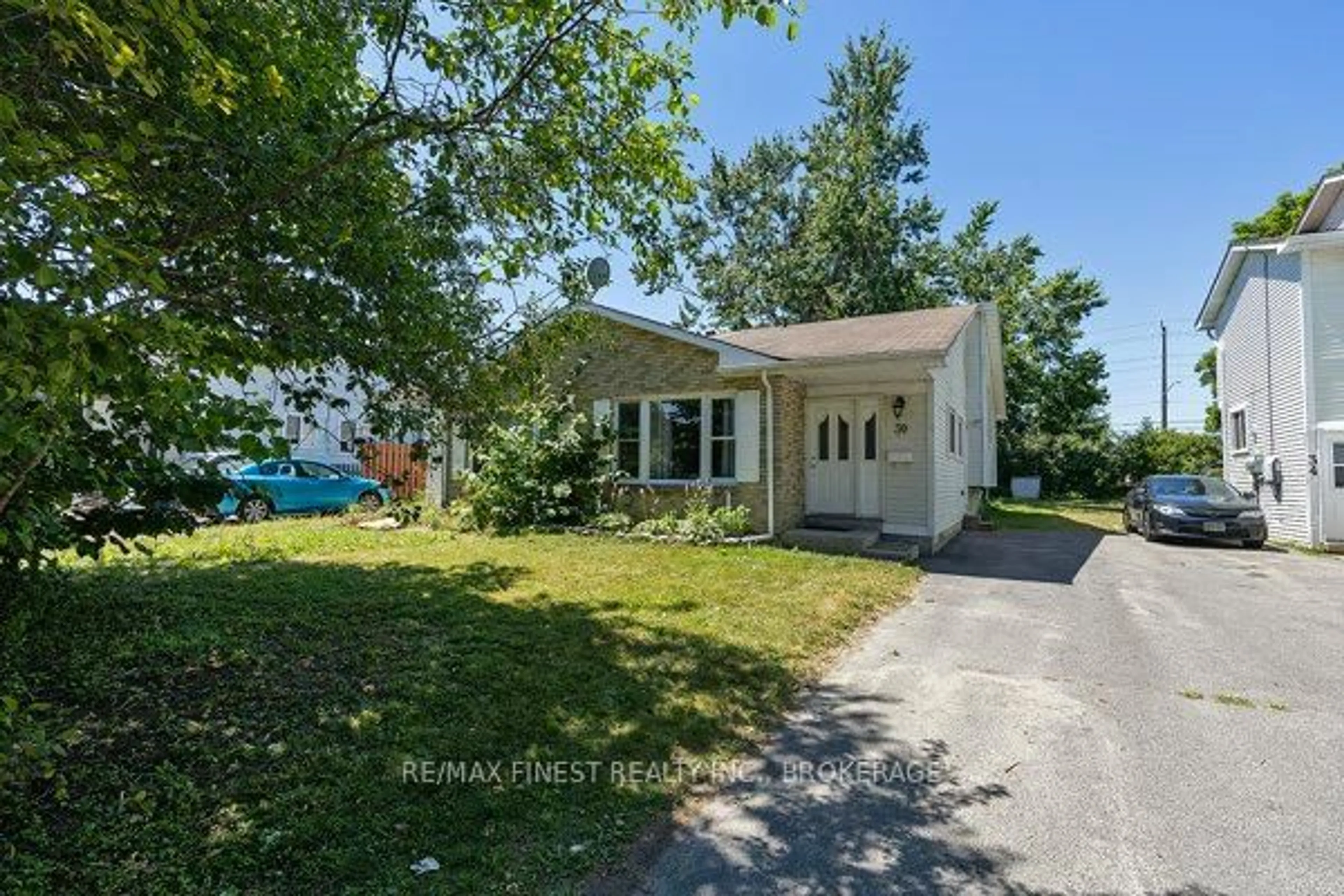 A pic from outside/outdoor area/front of a property/back of a property/a pic from drone, street for 30 Woodstone Cres, Kingston Ontario K7M 6K9