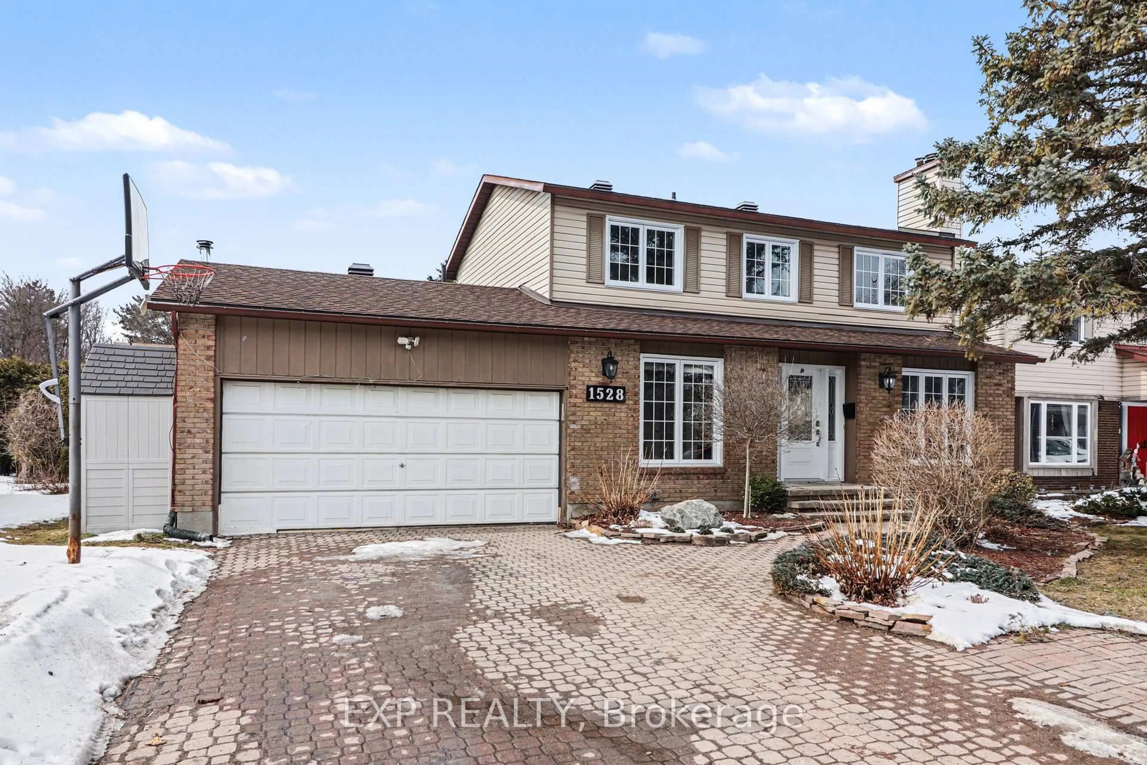 Home with brick exterior material, street for 1528 Missyabit Dr, Ottawa Ontario K1E 2M6