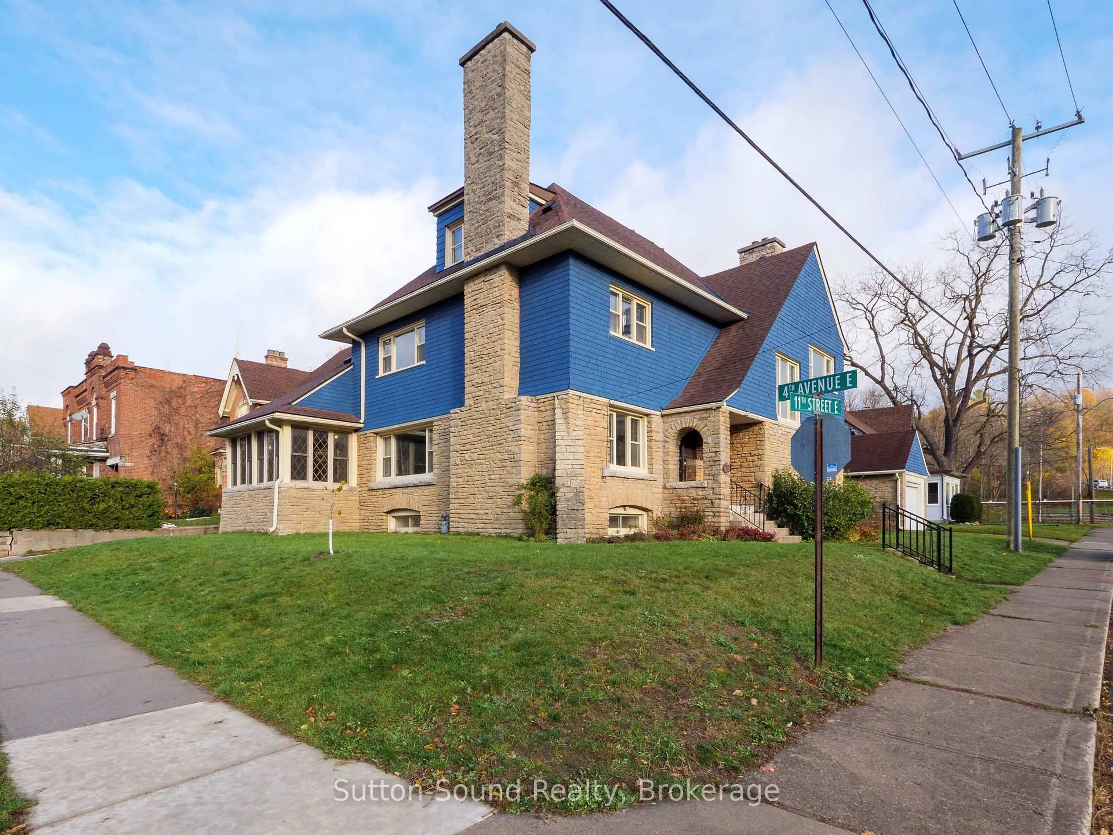 Home with brick exterior material, street for 412 11th St East St, Owen Sound Ontario N4K 1V4