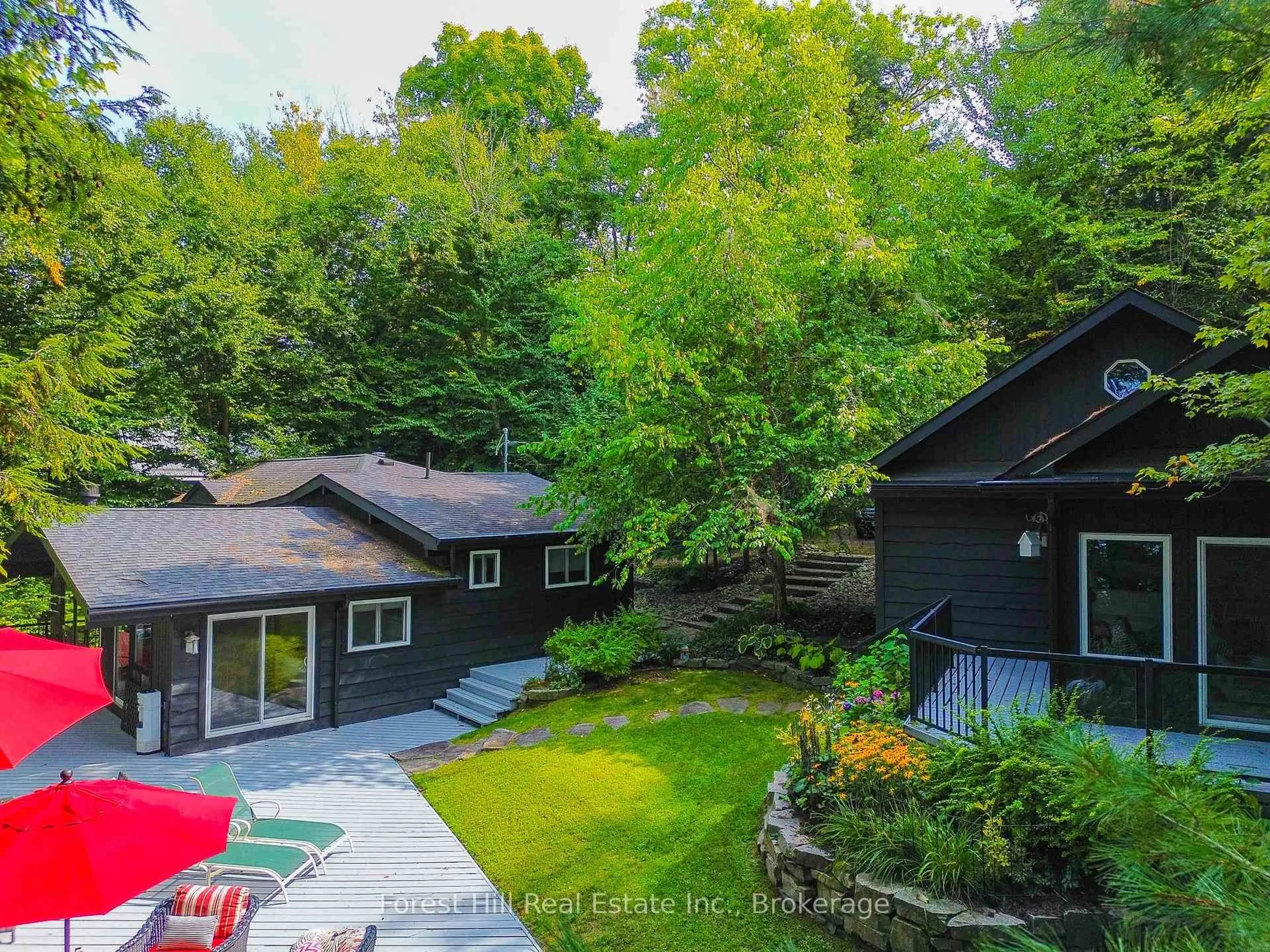 A pic from outside/outdoor area/front of a property/back of a property/a pic from drone, forest/trees view for 21 Lakeview Cres, Seguin Ontario P2A 0B2
