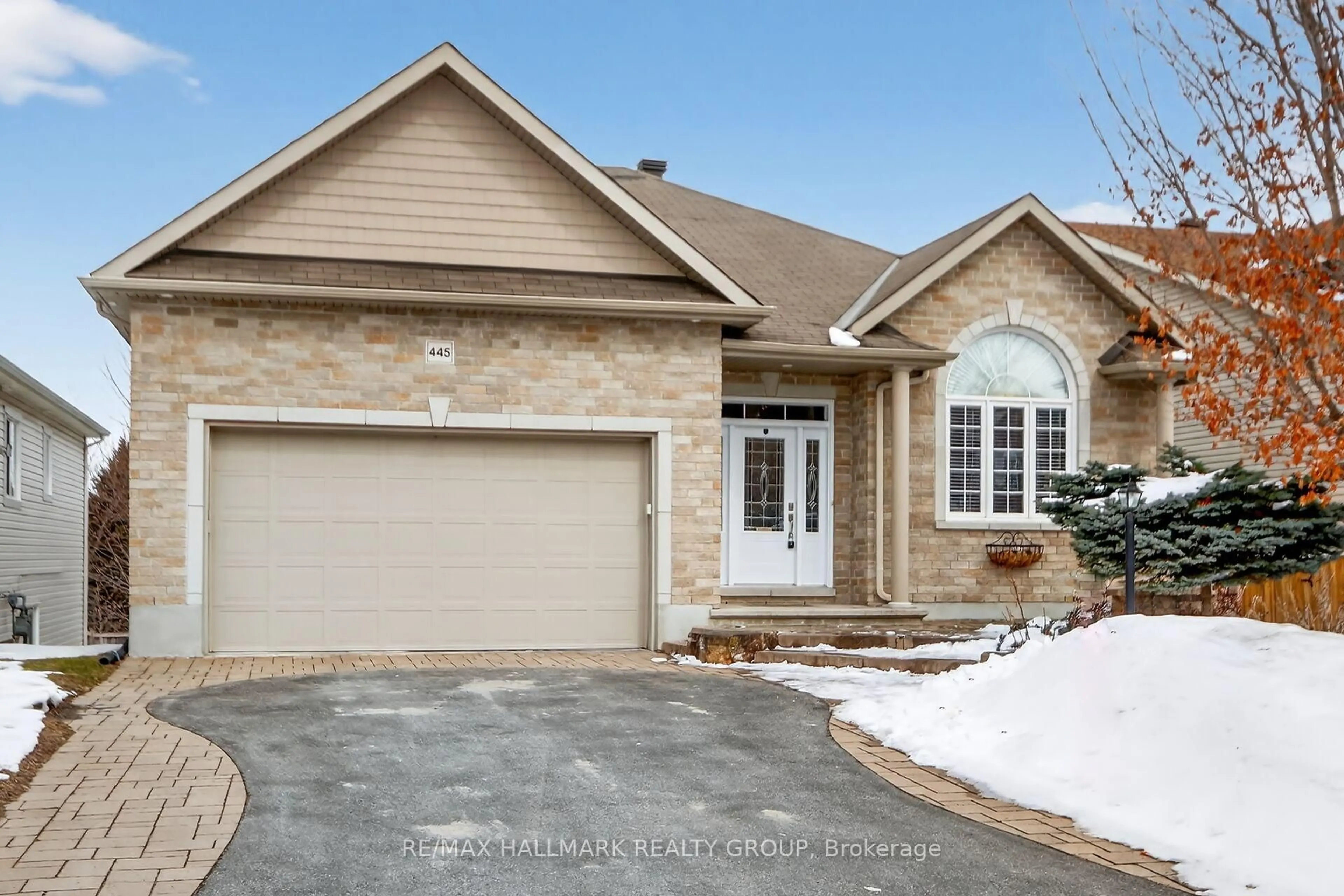 Home with brick exterior material, street for 445 Landswood Way, Ottawa Ontario K2S 0A4