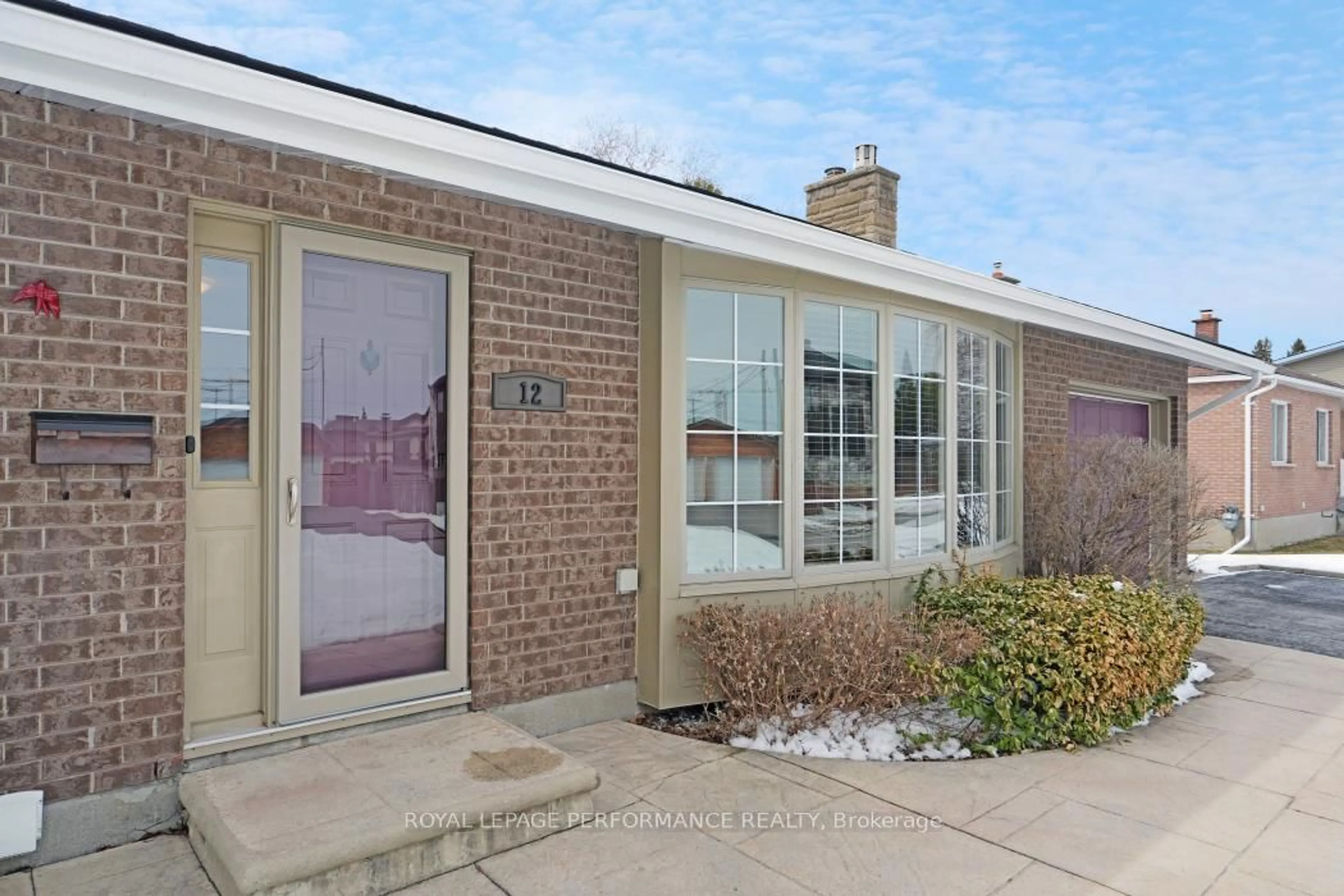 Home with brick exterior material, street for 12 Willeth Ave, Ottawa Ontario K2E 5C1