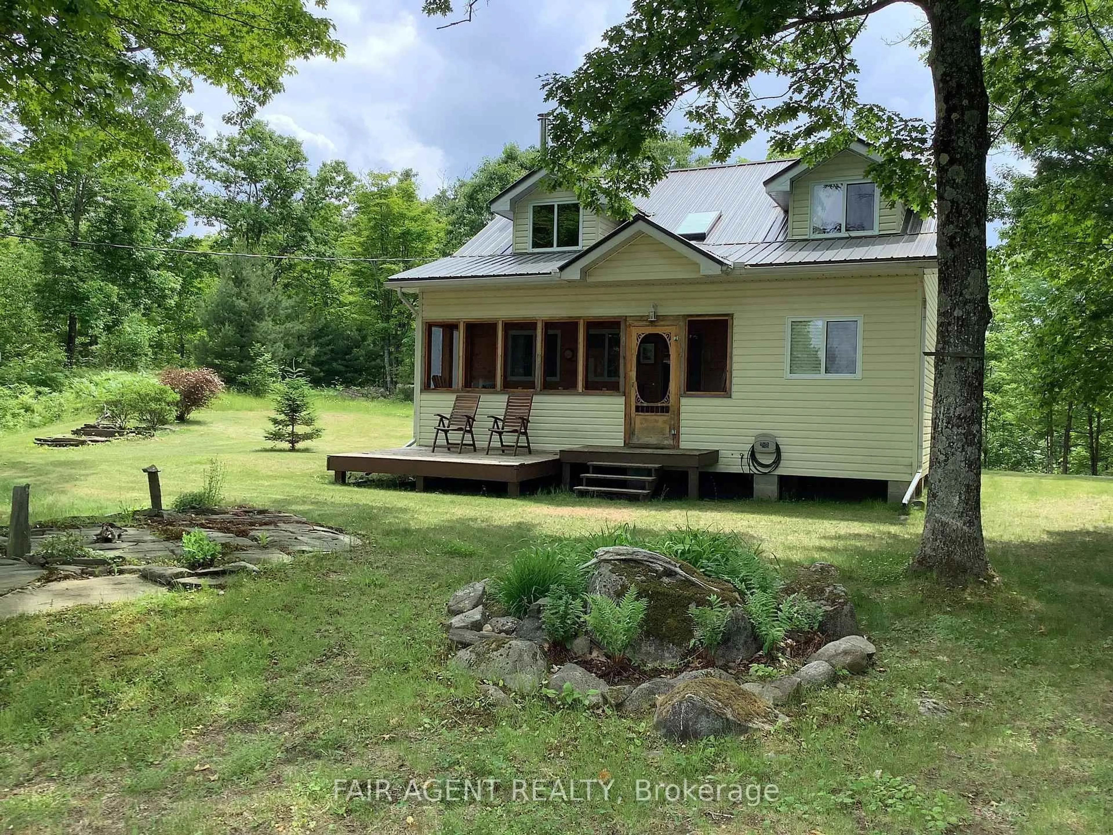 A pic from outside/outdoor area/front of a property/back of a property/a pic from drone, water/lake/river/ocean view for 1165B KIRK KOVE Rd, Arden Ontario K0H 1B0