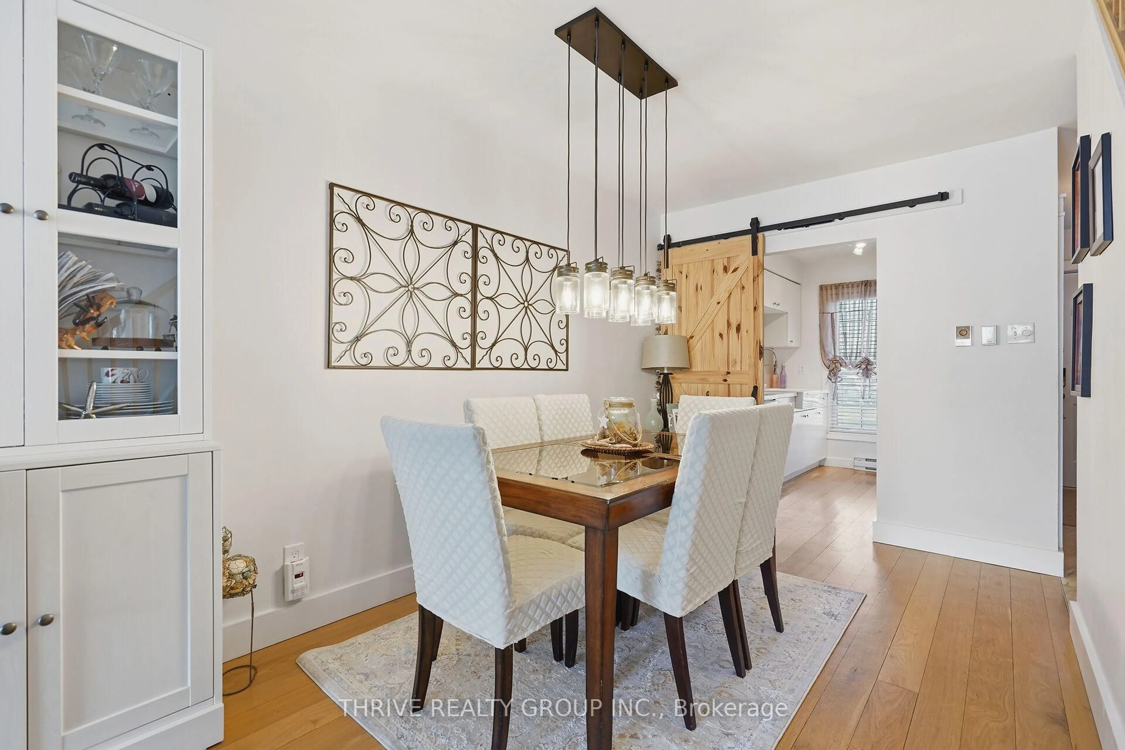 Dining room, wood/laminate floor for 12 Guildwood Walk, London North Ontario N6H 3X2