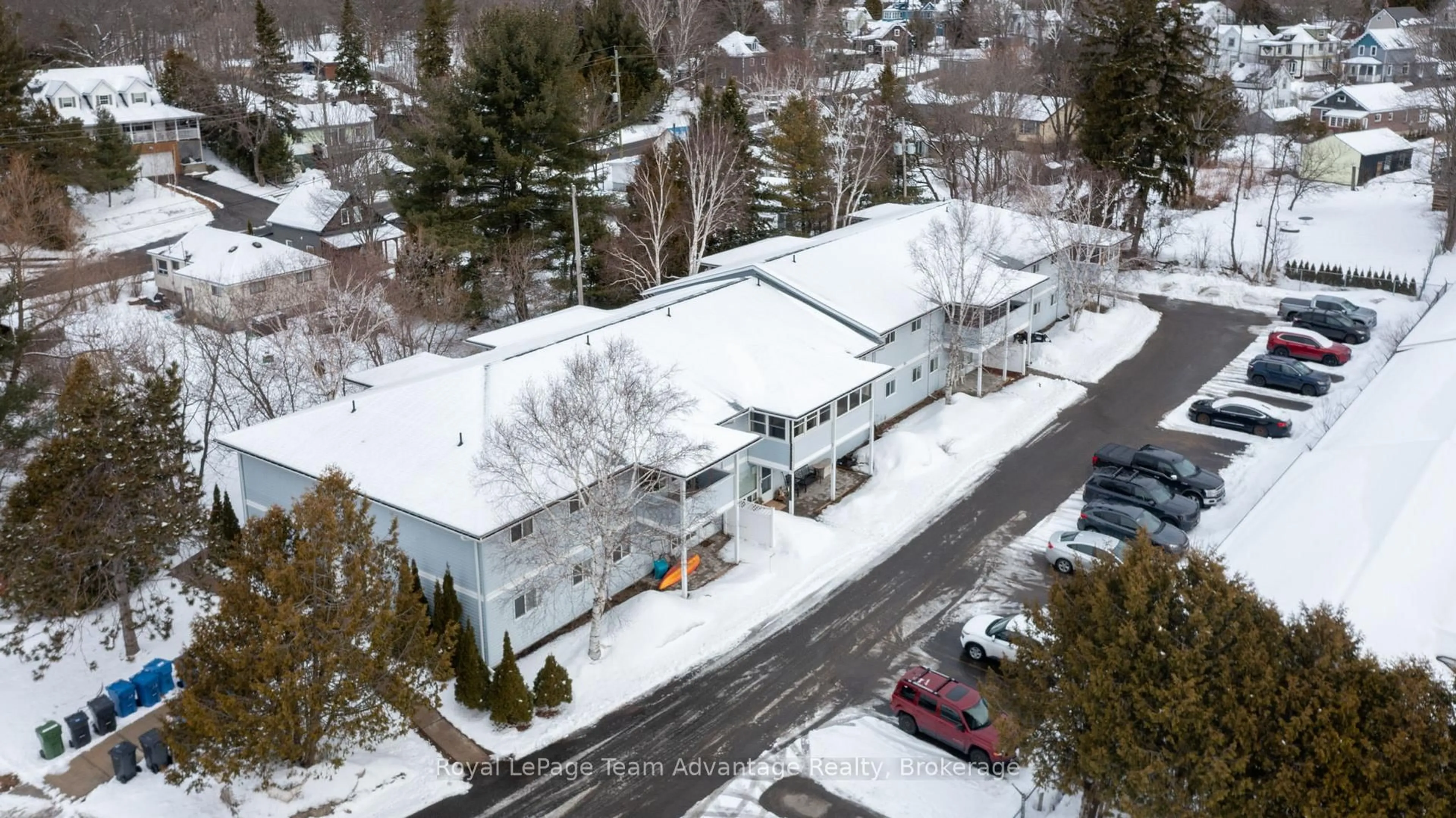 A pic from outside/outdoor area/front of a property/back of a property/a pic from drone, unknown for 1 Georgian Bay Ave #104, Parry Sound Ontario P2A 3B1