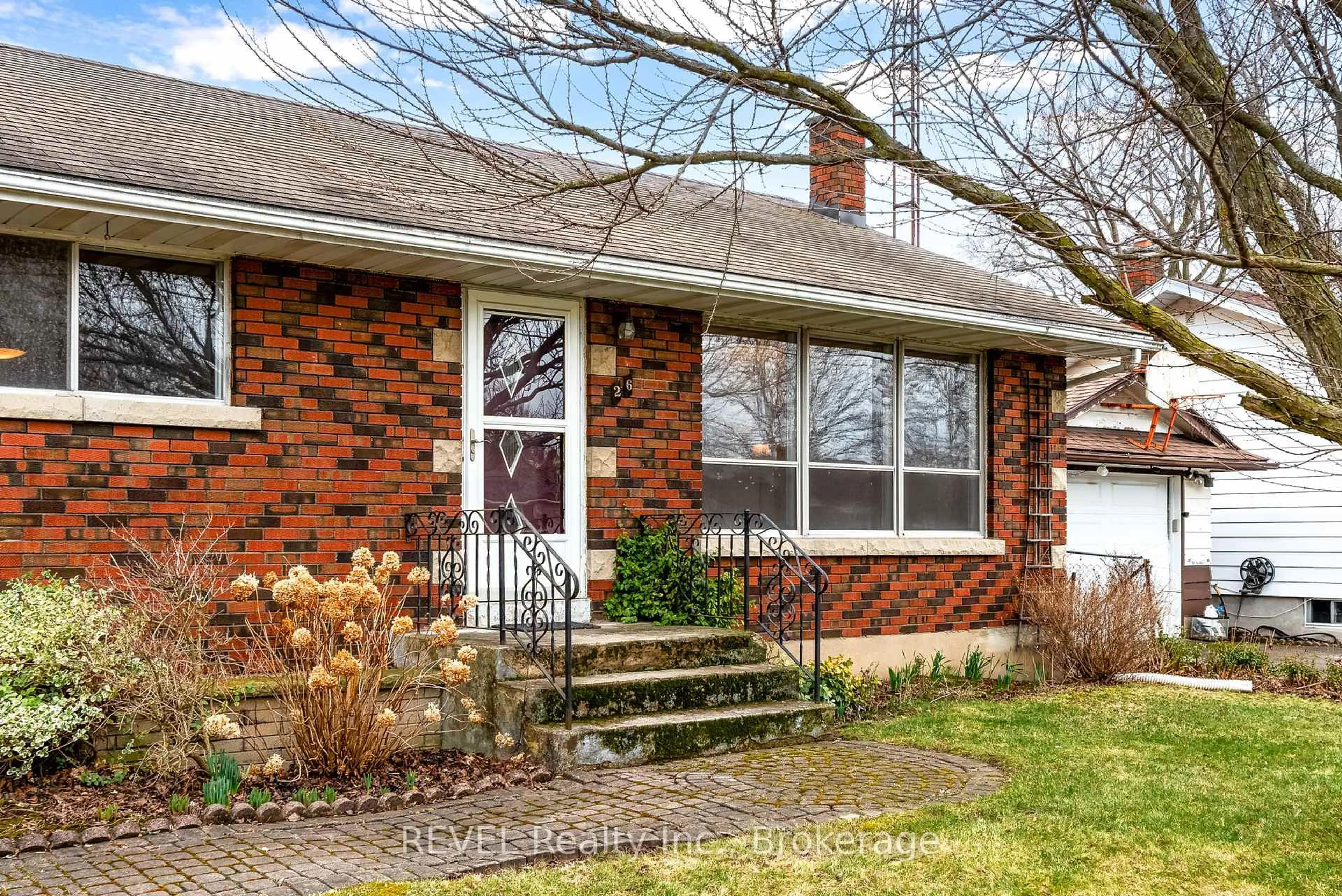 Home with brick exterior material, street for 26 McKenzie St, St. Catharines Ontario L2M 2N1