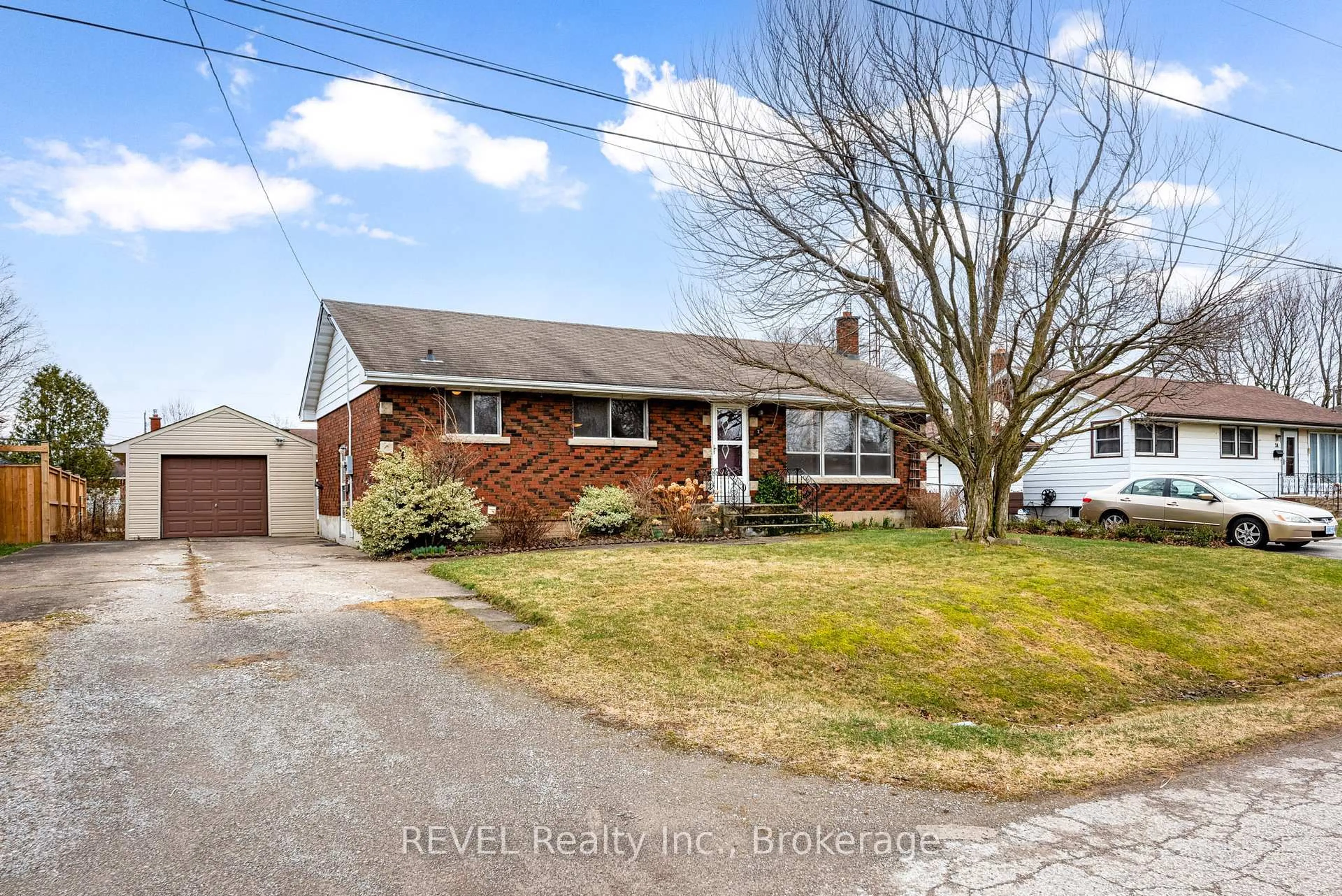 Home with brick exterior material, street for 26 McKenzie St, St. Catharines Ontario L2M 2N1