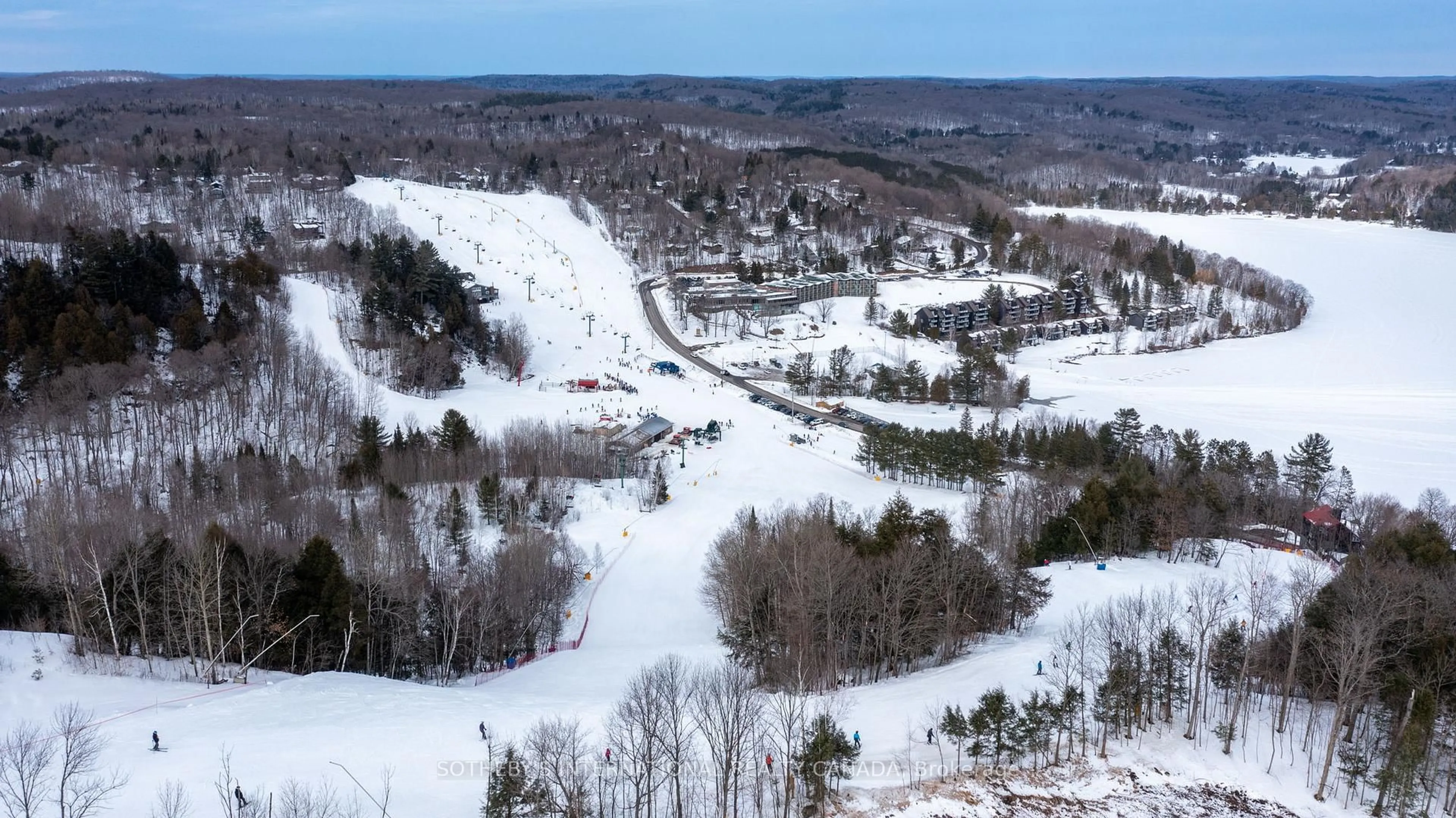 A pic from outside/outdoor area/front of a property/back of a property/a pic from drone, mountain view for 3 TREE TOPS Lane #302, Huntsville Ontario P1H 1A9