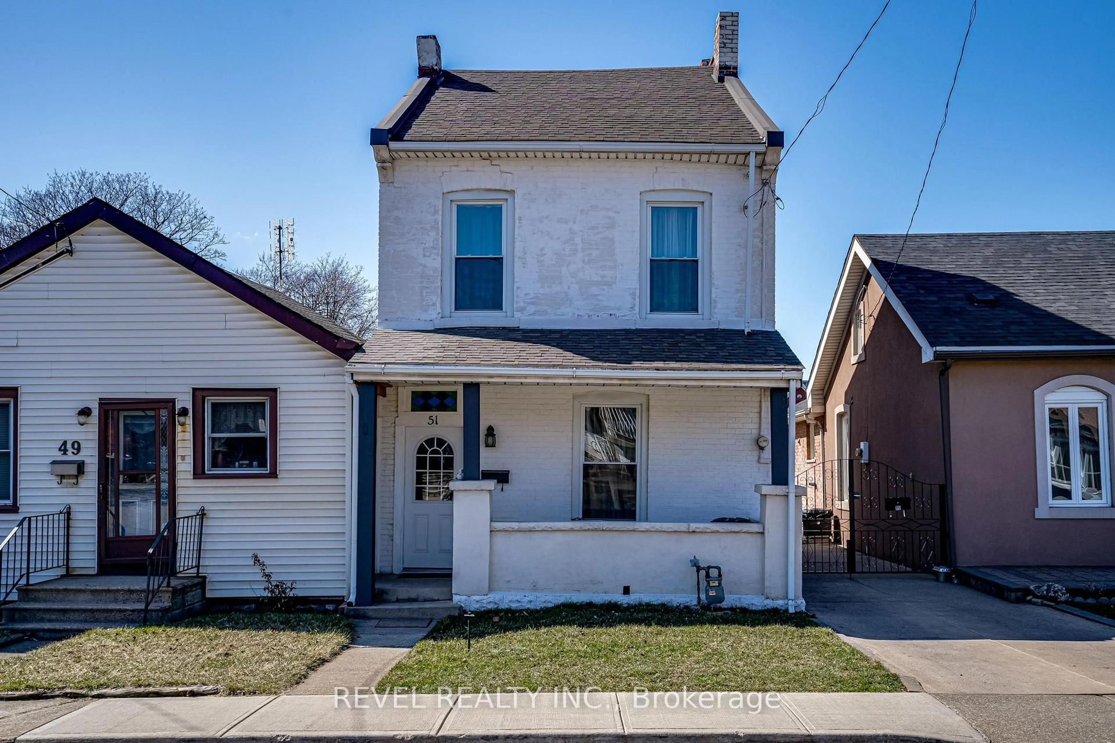 Home with brick exterior material, street for 51 Tisdale St, Hamilton Ontario L8L 5M3