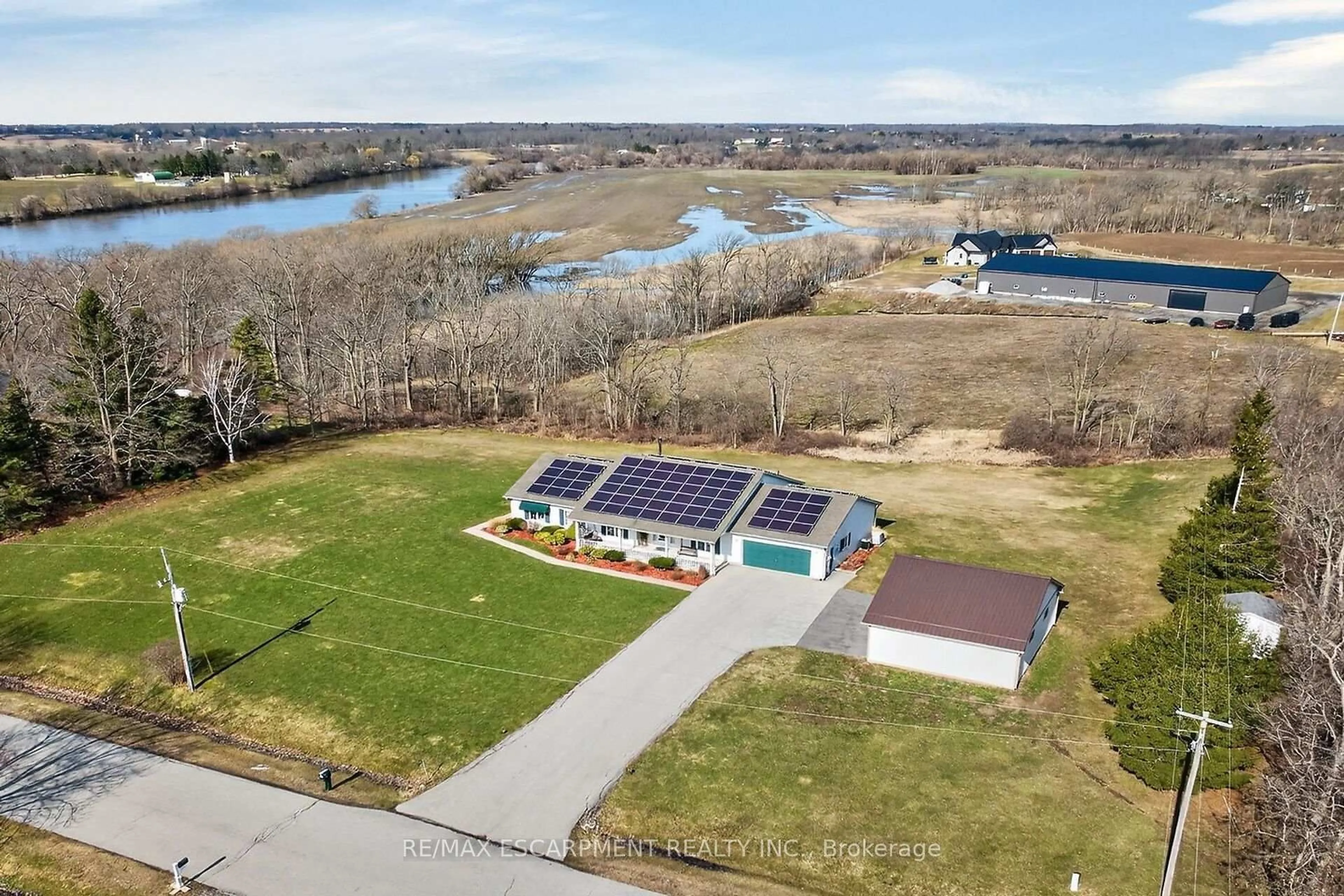 A pic from outside/outdoor area/front of a property/back of a property/a pic from drone, water/lake/river/ocean view for 2 FOXLOW Cres, Haldimand Ontario N0A 1E0