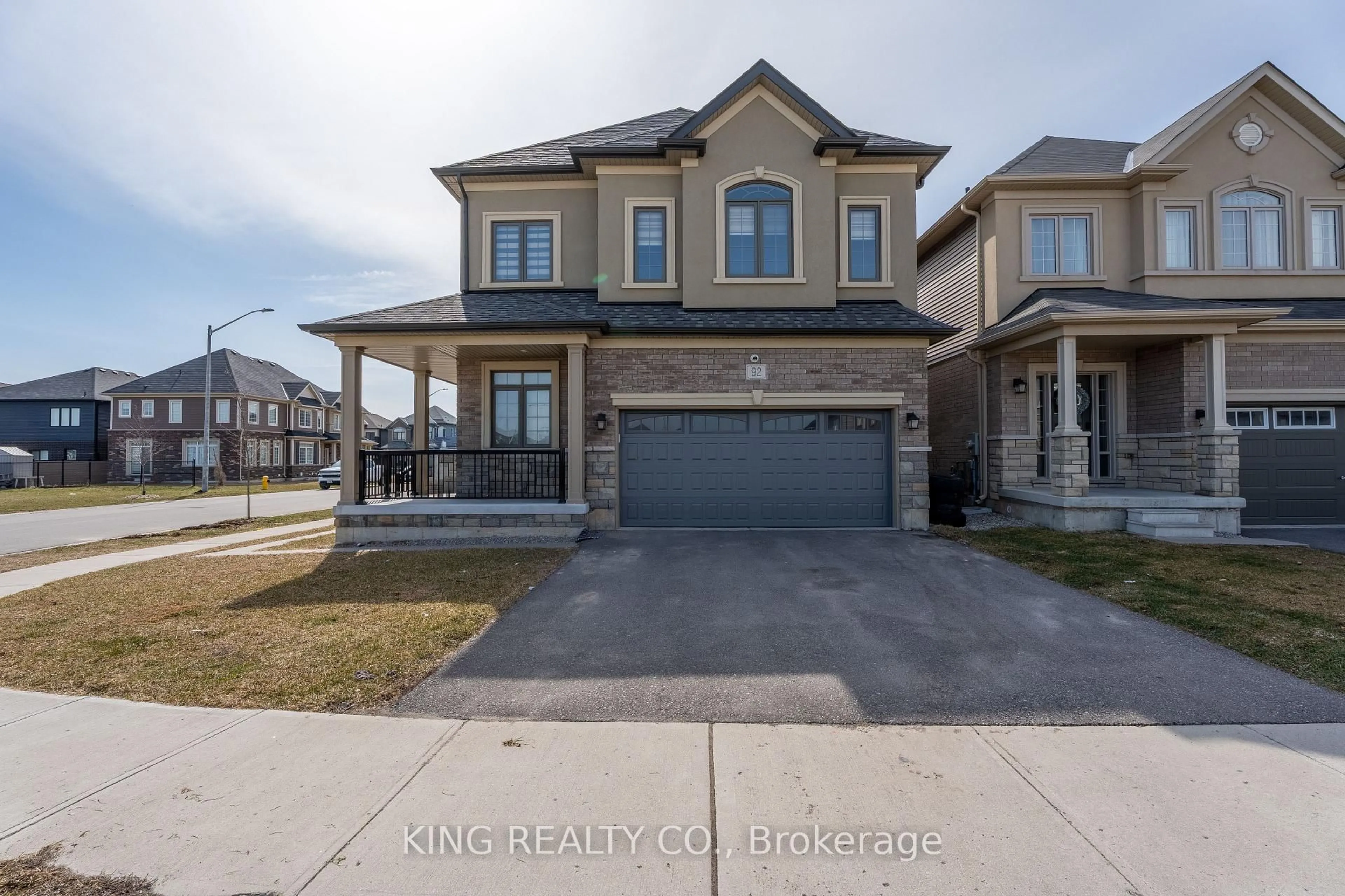 Home with brick exterior material, street for 92 Scenic Ridge Gate, Brant Ontario N3L 3E3