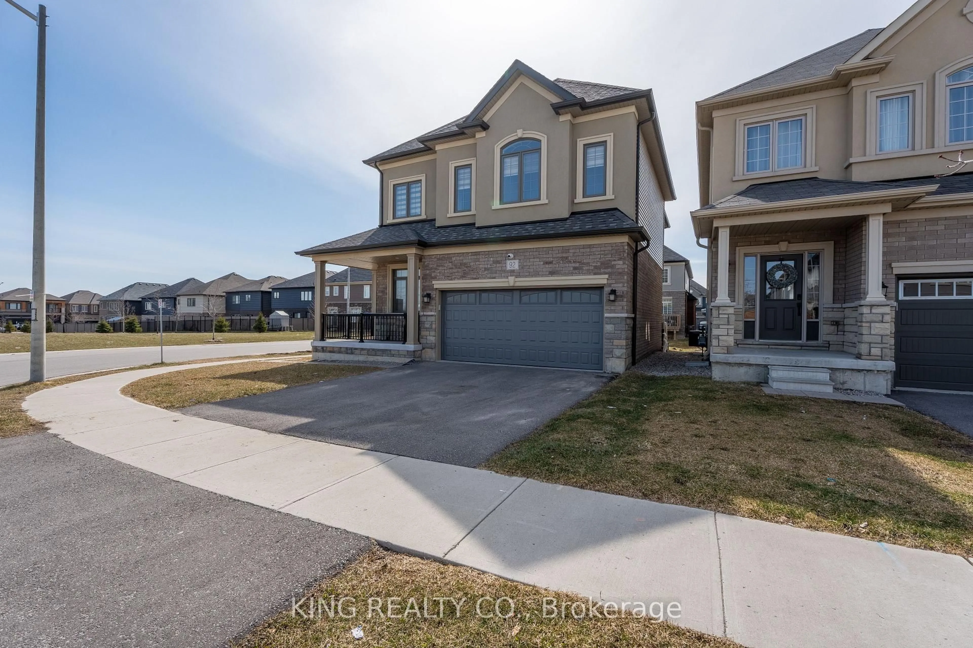 A pic from outside/outdoor area/front of a property/back of a property/a pic from drone, street for 92 Scenic Ridge Gate, Brant Ontario N3L 3E3