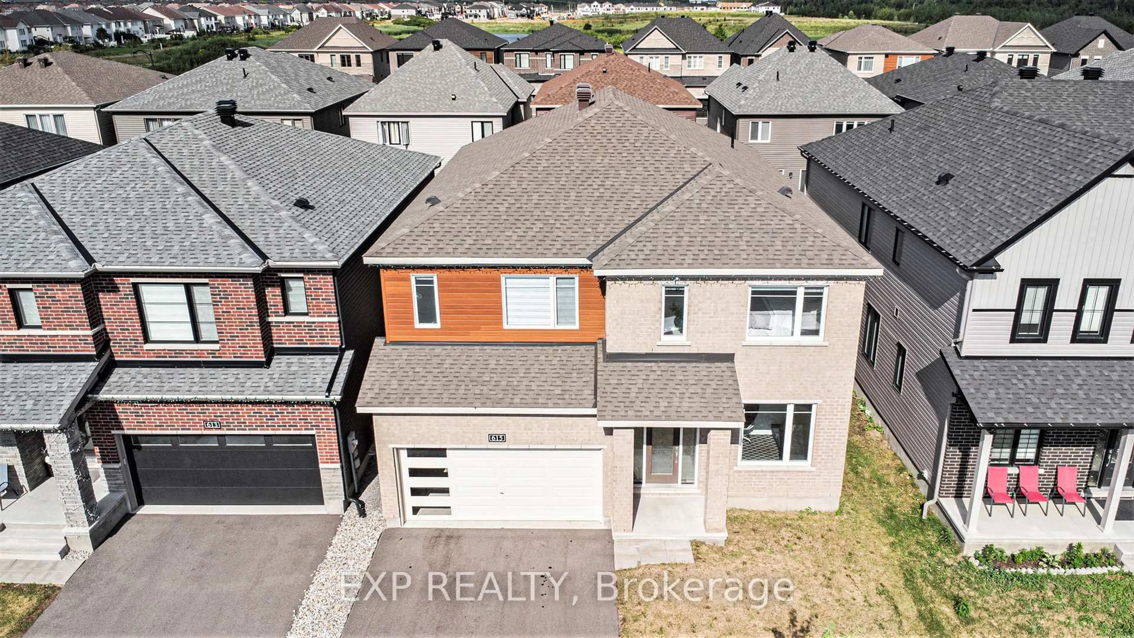 A pic from outside/outdoor area/front of a property/back of a property/a pic from drone, street for 615 IDYLLIC Terr, Ottawa Ontario K4A 5N9