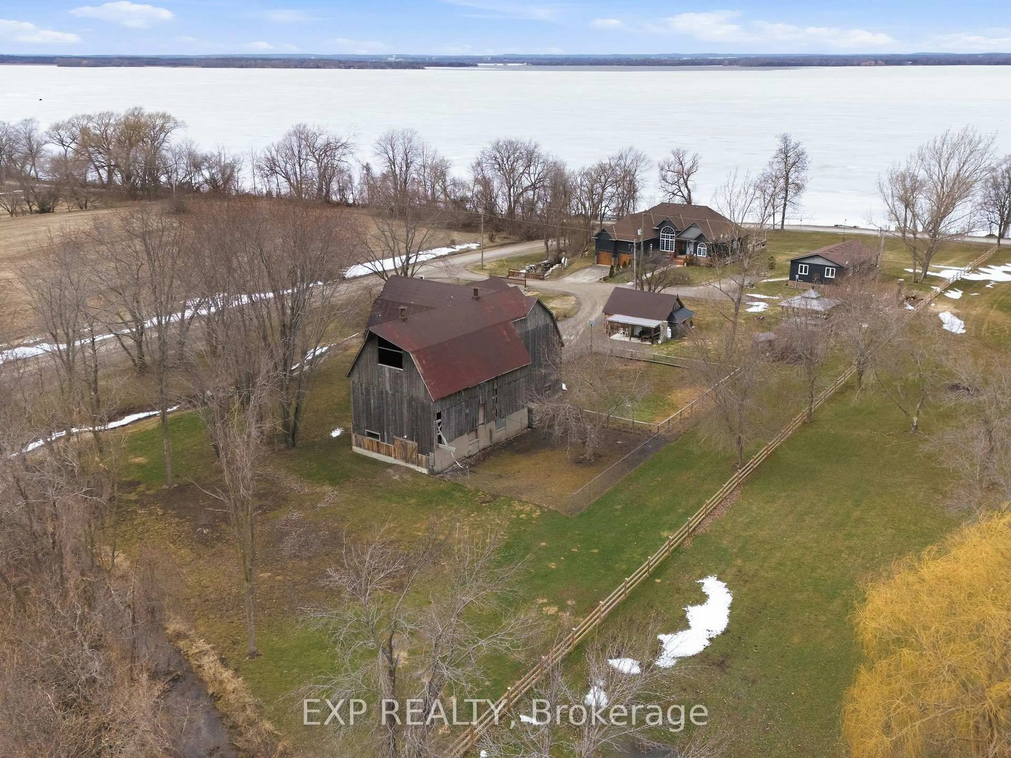 A pic from outside/outdoor area/front of a property/back of a property/a pic from drone, water/lake/river/ocean view for 516 ALLISON Rd, Prince Edward County Ontario K0K 1W0