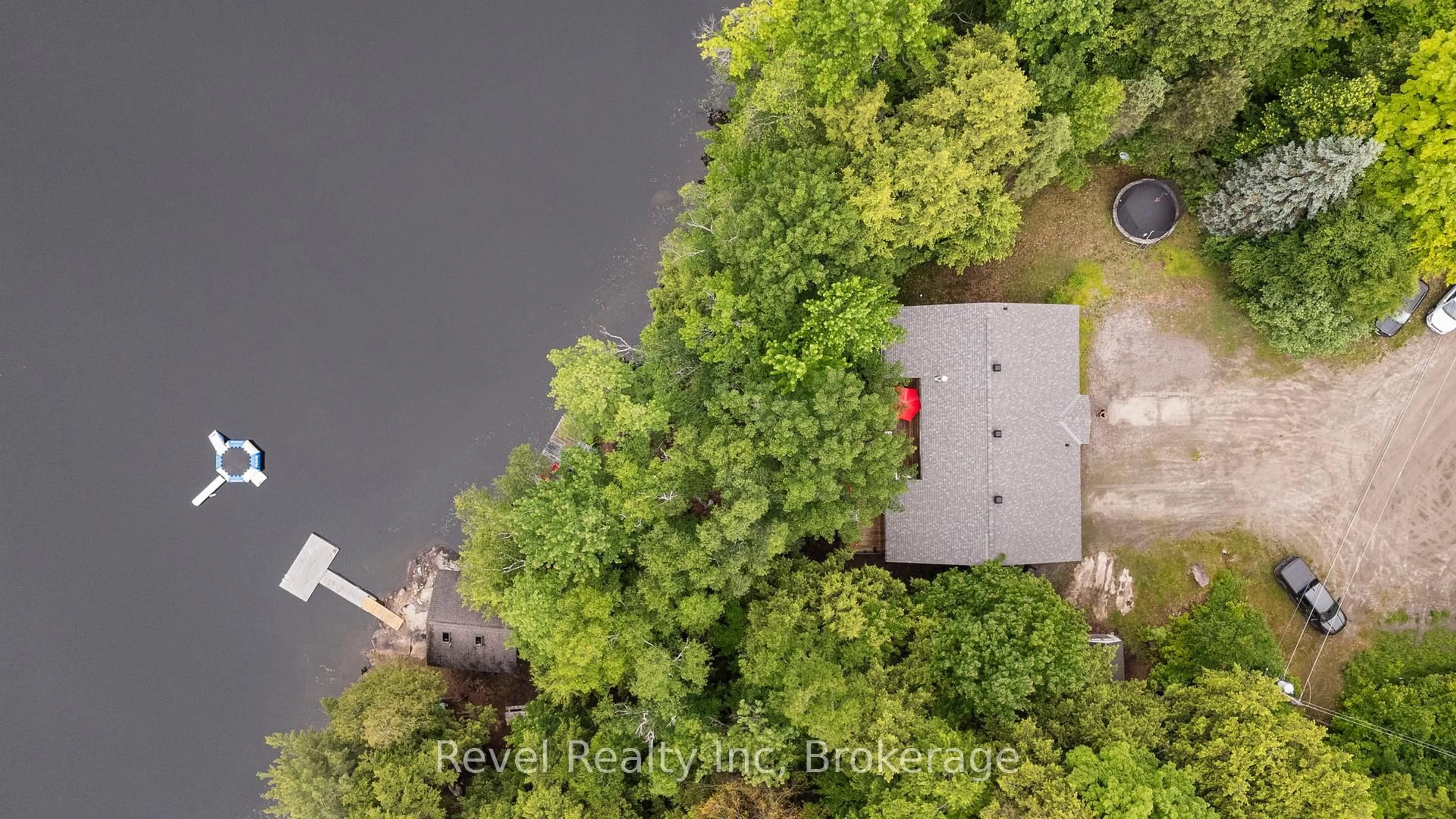 A pic from outside/outdoor area/front of a property/back of a property/a pic from drone, water/lake/river/ocean view for 30 Sparrow Rd, Seguin Ontario P0C 1J0