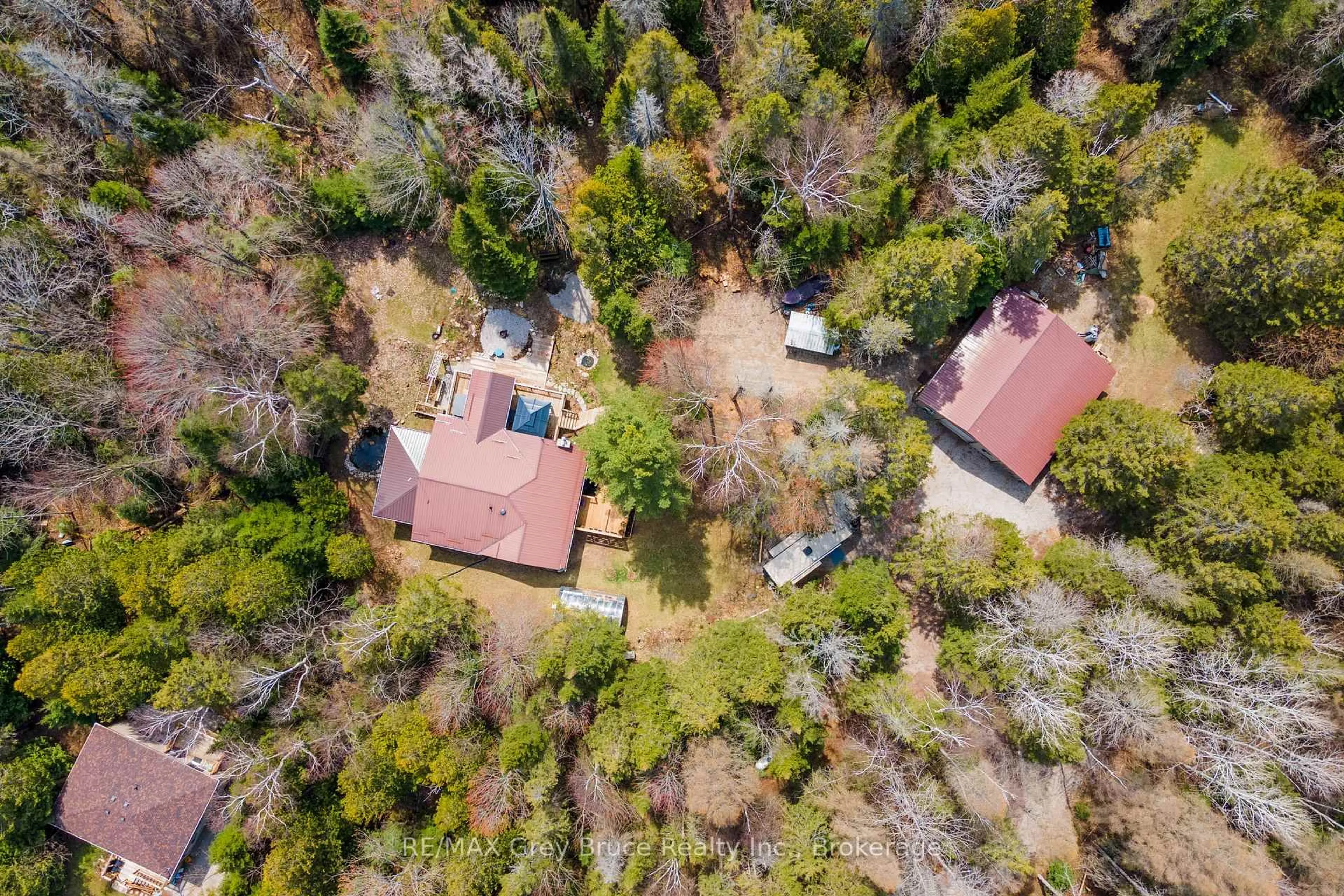 A pic from outside/outdoor area/front of a property/back of a property/a pic from drone, forest/trees view for 33 WOODSTOCK Ave, Northern Bruce Peninsula Ontario N0H 2M0