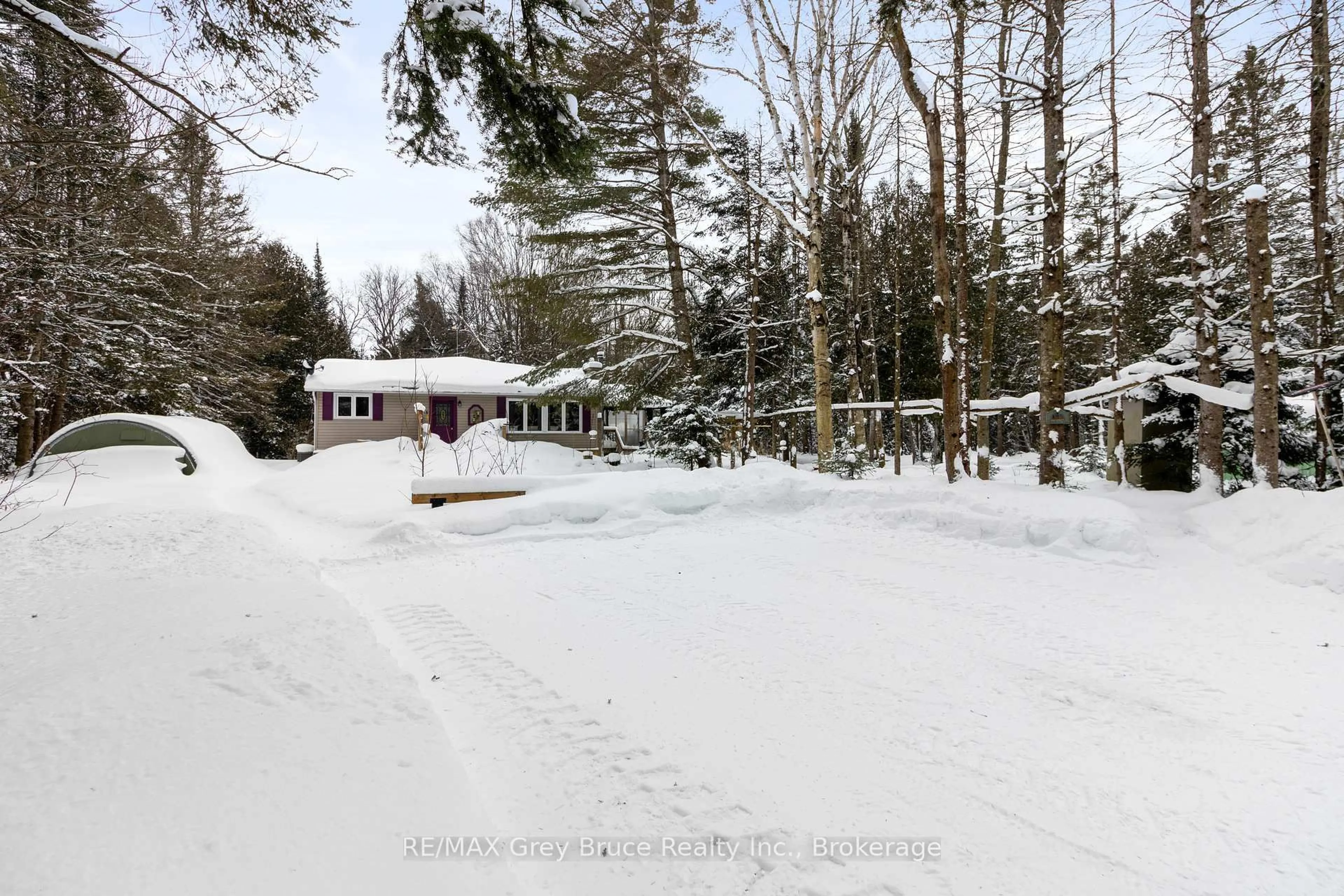 A pic from outside/outdoor area/front of a property/back of a property/a pic from drone, street for 33 WOODSTOCK Ave, Northern Bruce Peninsula Ontario N0H 2M0