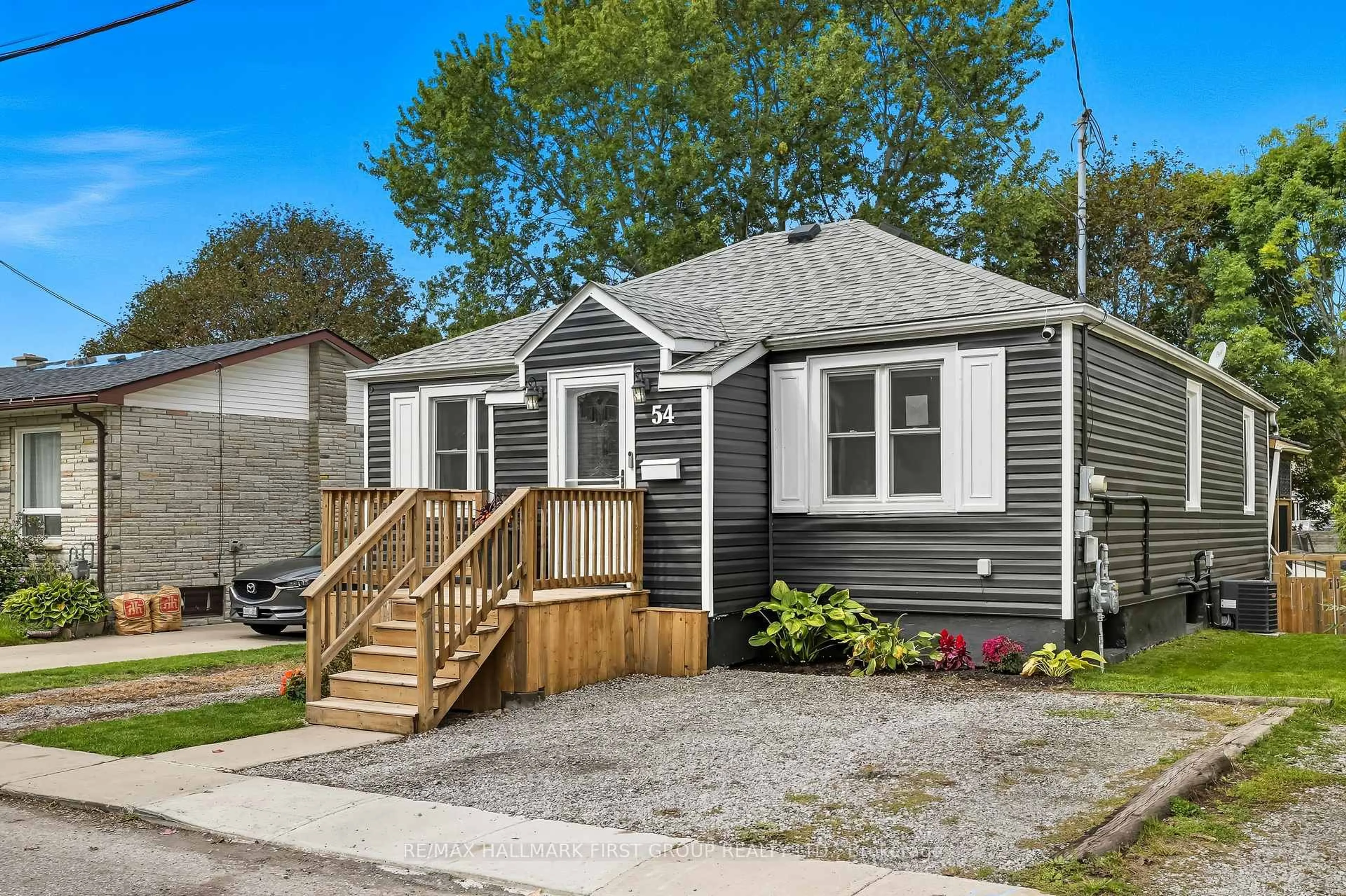 Home with vinyl exterior material, street for 54 Harcourt St, Port Hope Ontario L1A 1M4