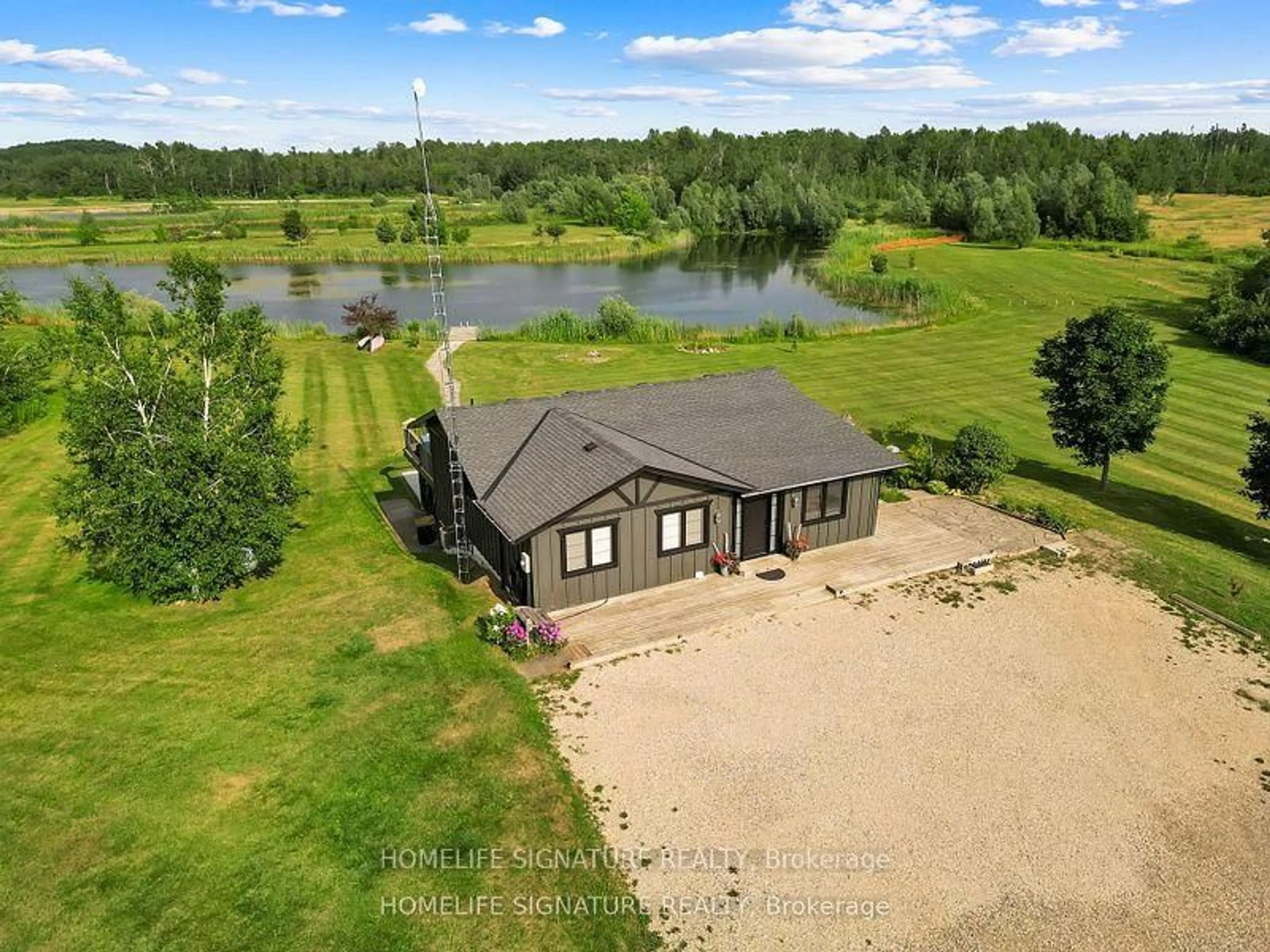 A pic from outside/outdoor area/front of a property/back of a property/a pic from drone, water/lake/river/ocean view for 375721 6th Line, Amaranth Ontario L0N 1S5