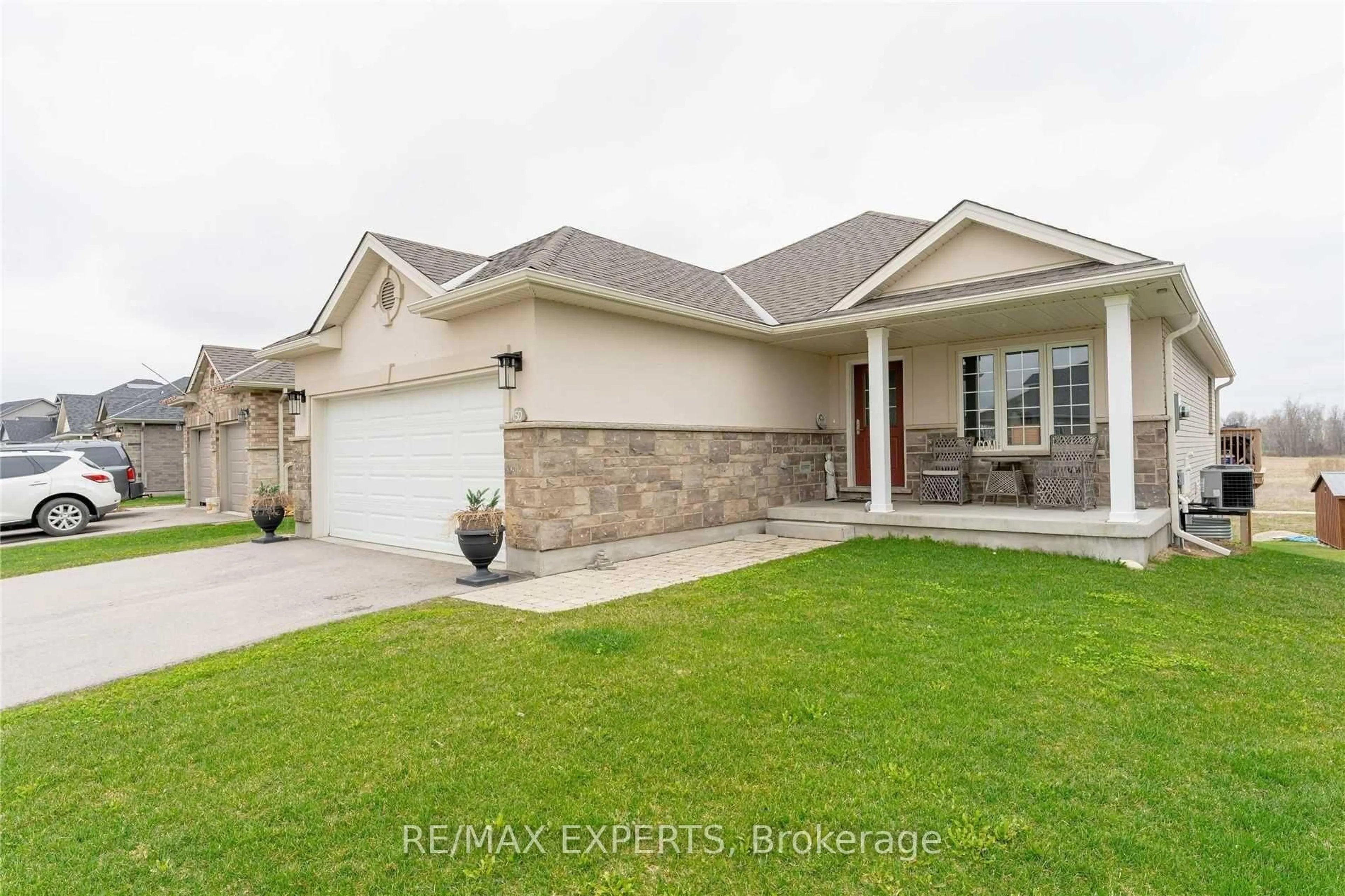 Home with brick exterior material, street for 150 Bridge Cres, Minto Ontario N0G 2P0