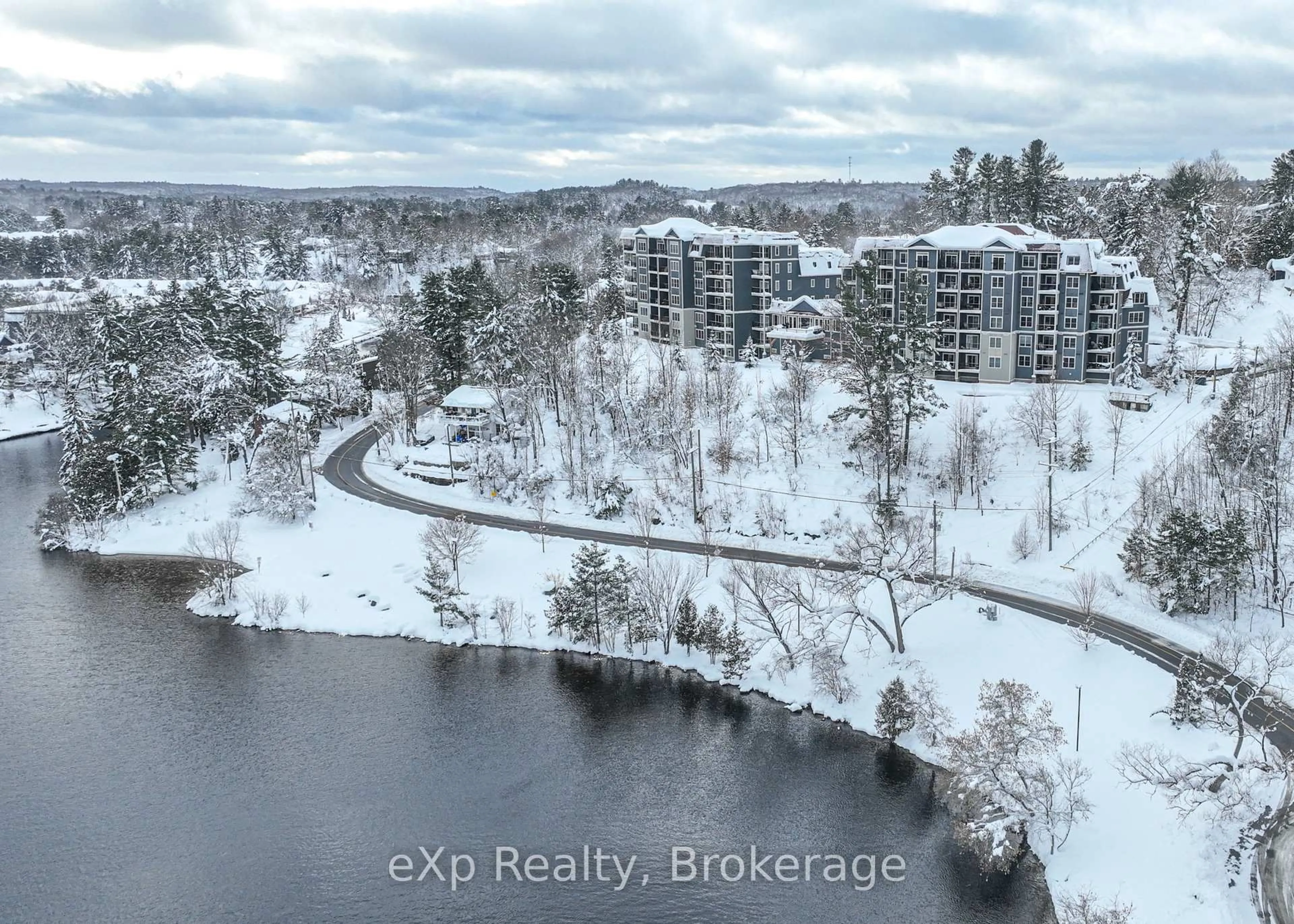 A pic from outside/outdoor area/front of a property/back of a property/a pic from drone, water/lake/river/ocean view for 10 Kimberley Ave #B/311, Bracebridge Ontario P1L 0A6