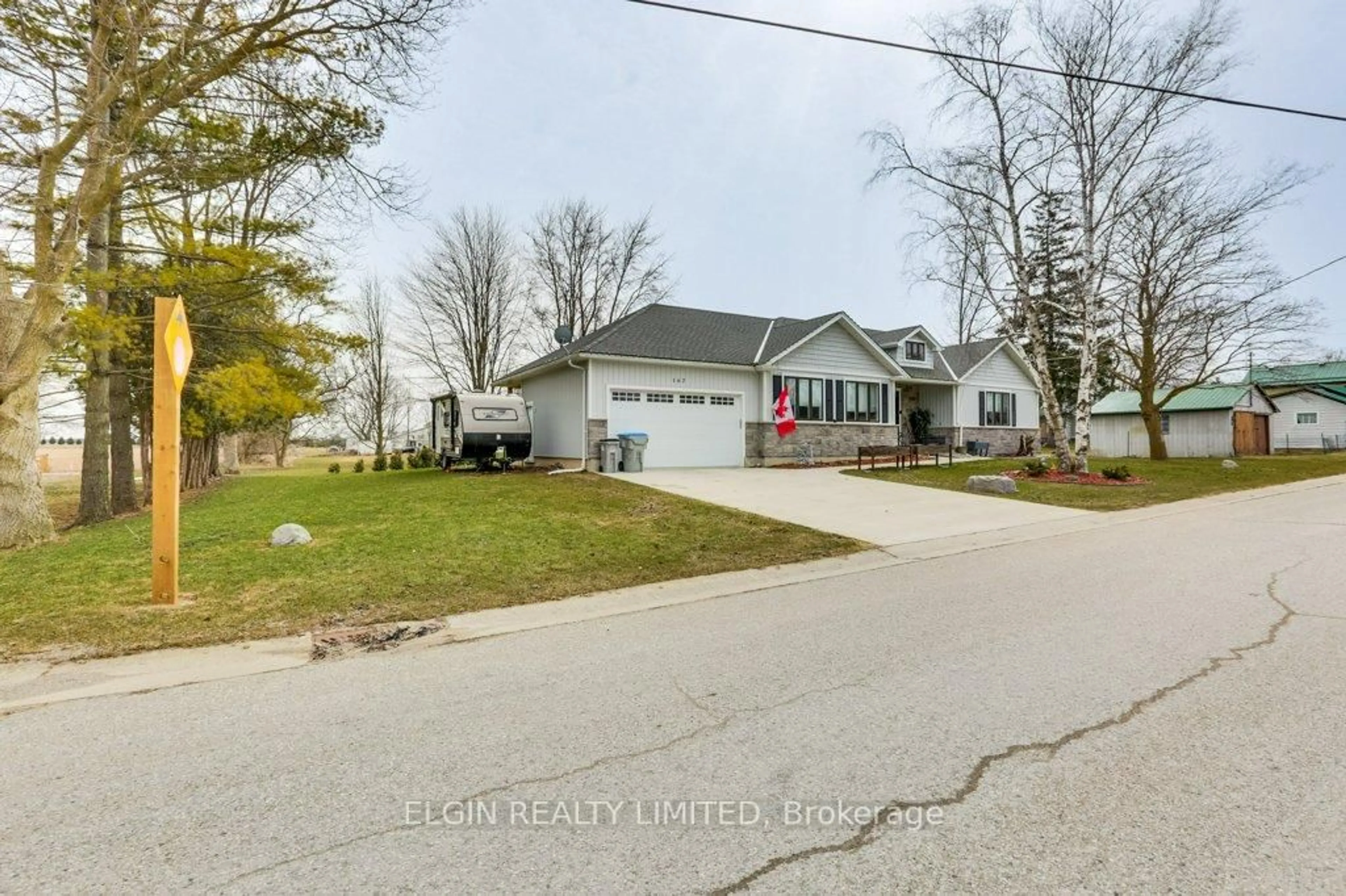 A pic from outside/outdoor area/front of a property/back of a property/a pic from drone, street for 167 Elgin St, South Huron Ontario N0M 1K0