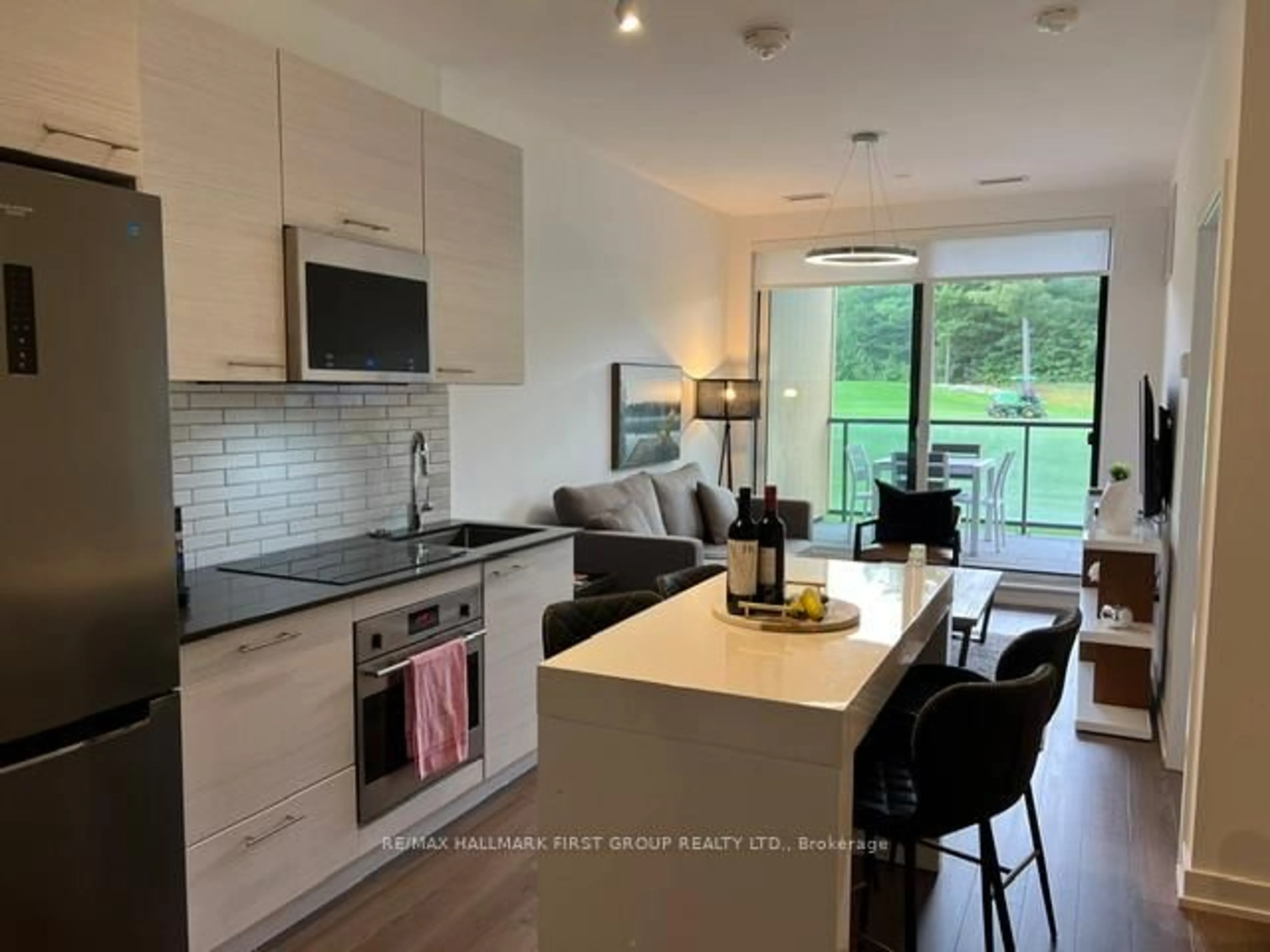 Open concept kitchen, unknown for 120 Carrick Tr #104, Gravenhurst Ontario P1P 0A2