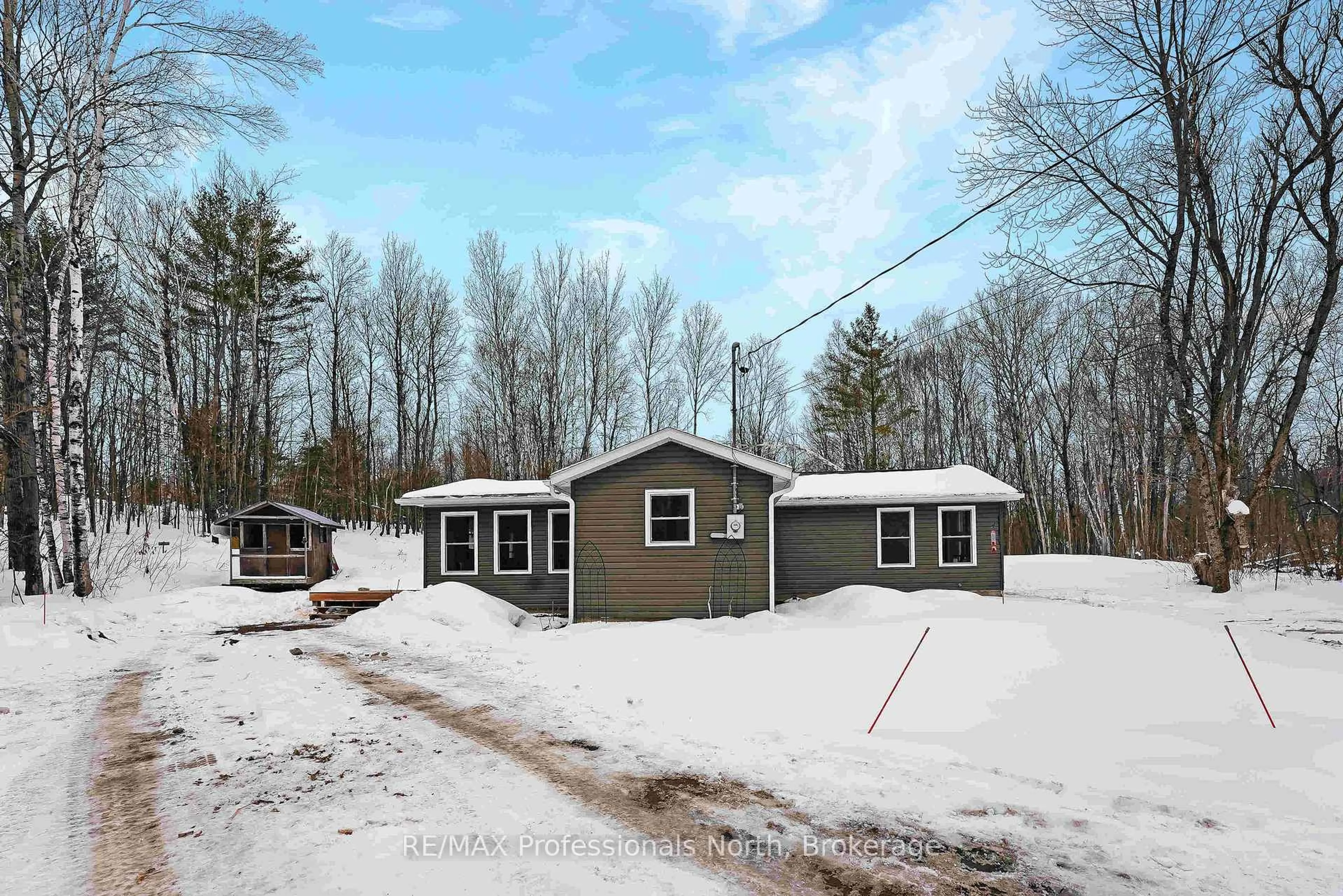 A pic from outside/outdoor area/front of a property/back of a property/a pic from drone, street for 1627 Old Donald Rd, Dysart et al Ontario K0M 1S0