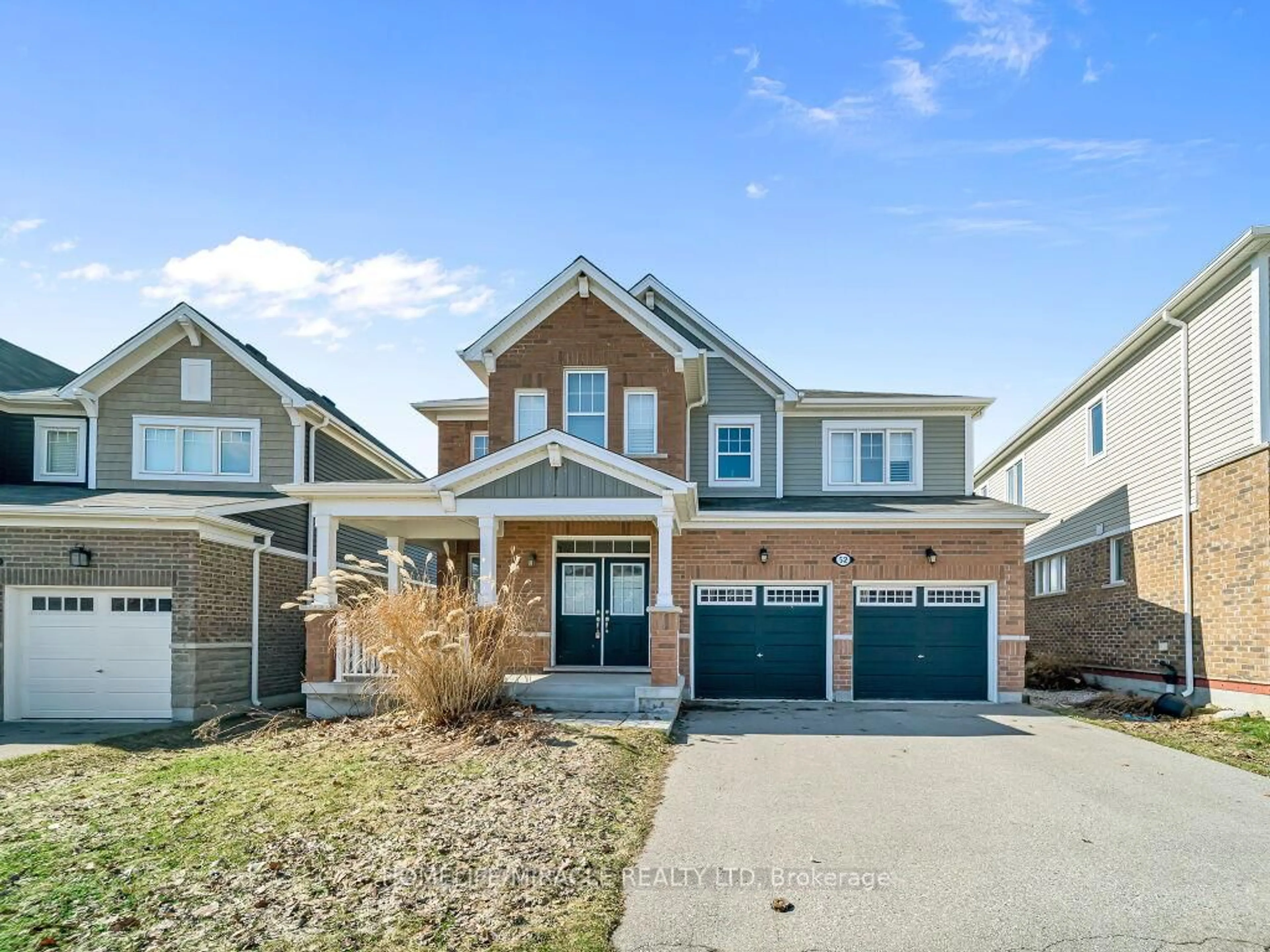 Home with brick exterior material, street for 52 Compass Tr, Cambridge Ontario N3E 0B7