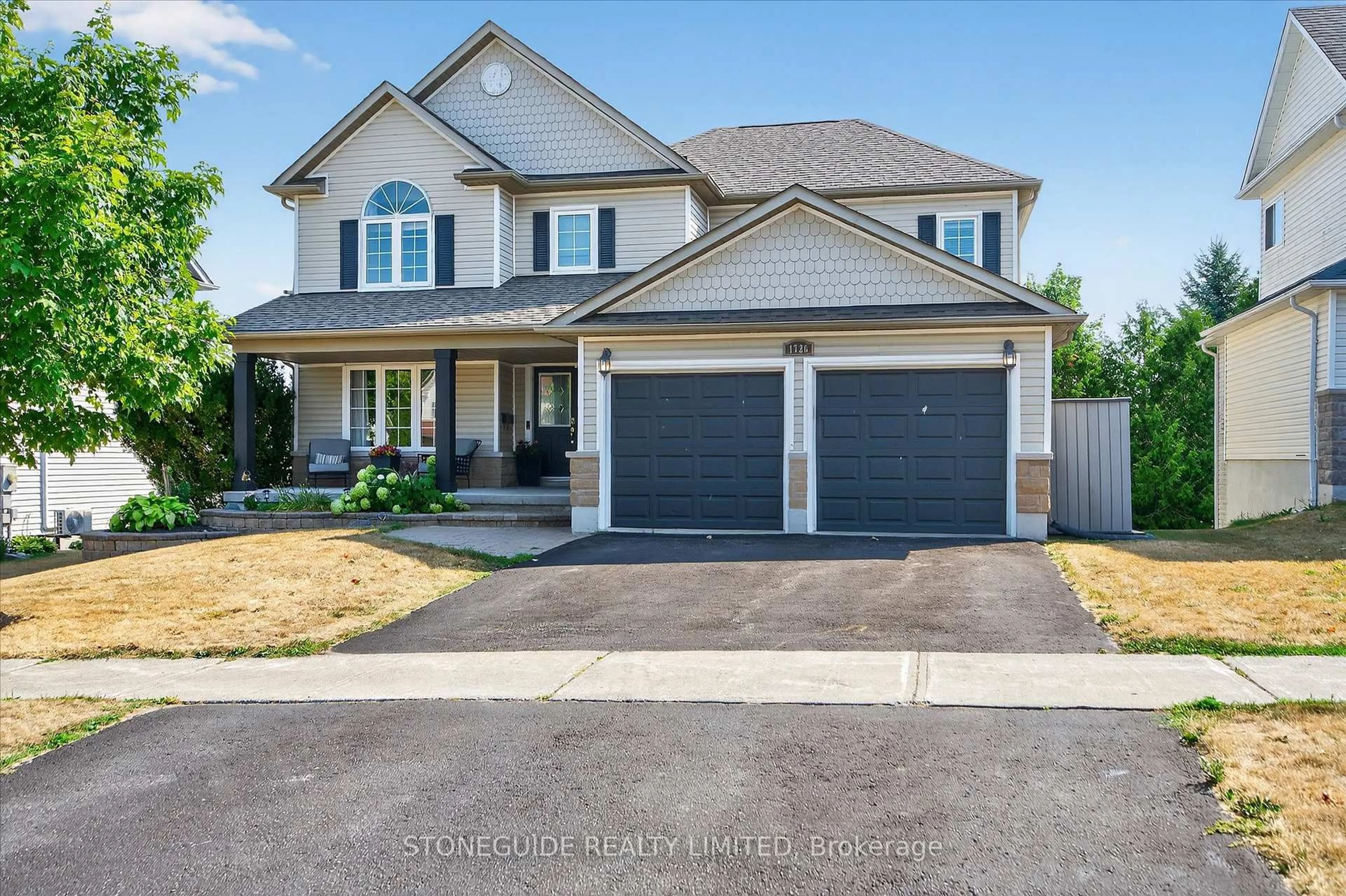Home with vinyl exterior material, street for 1726 Ravenwood Dr, Peterborough Ontario K9K 2P6