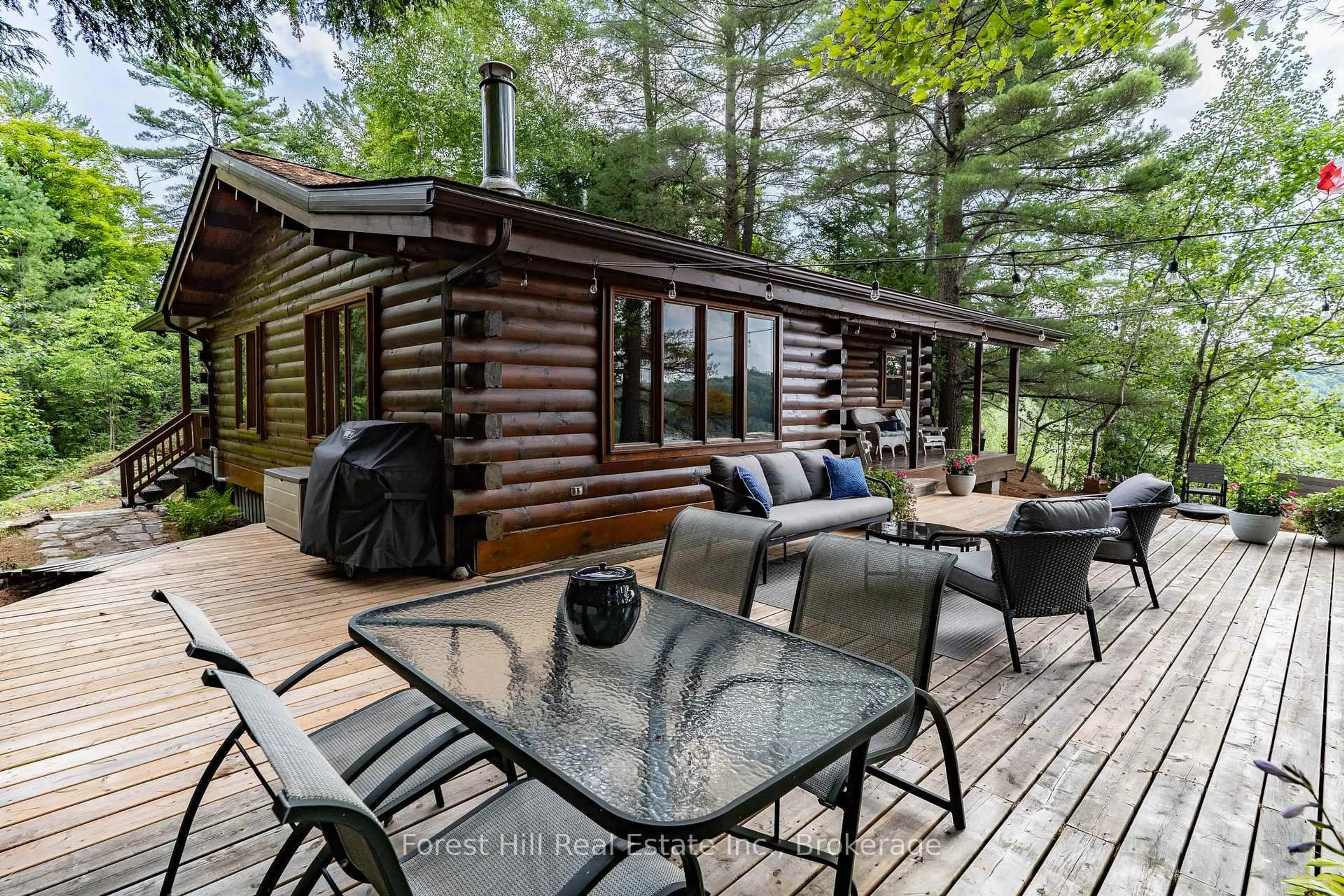 Patio, forest/trees view for 2324 hwy 141 (Beaumont bay rd) Rd #29, Muskoka Lakes Ontario P0B 1M0