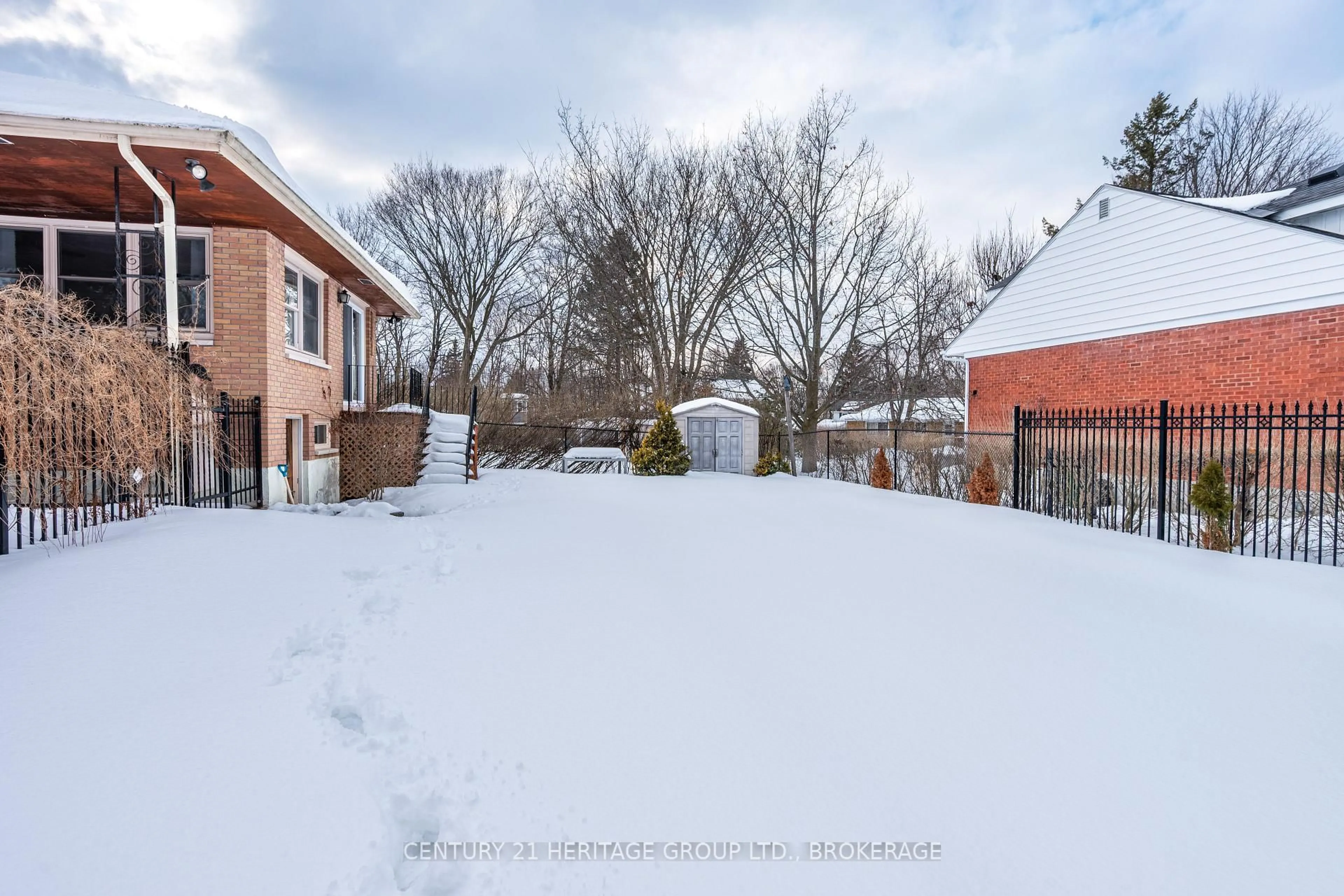 A pic from outside/outdoor area/front of a property/back of a property/a pic from drone, street for 74 McMichael St, Kingston Ontario K7M 1N2