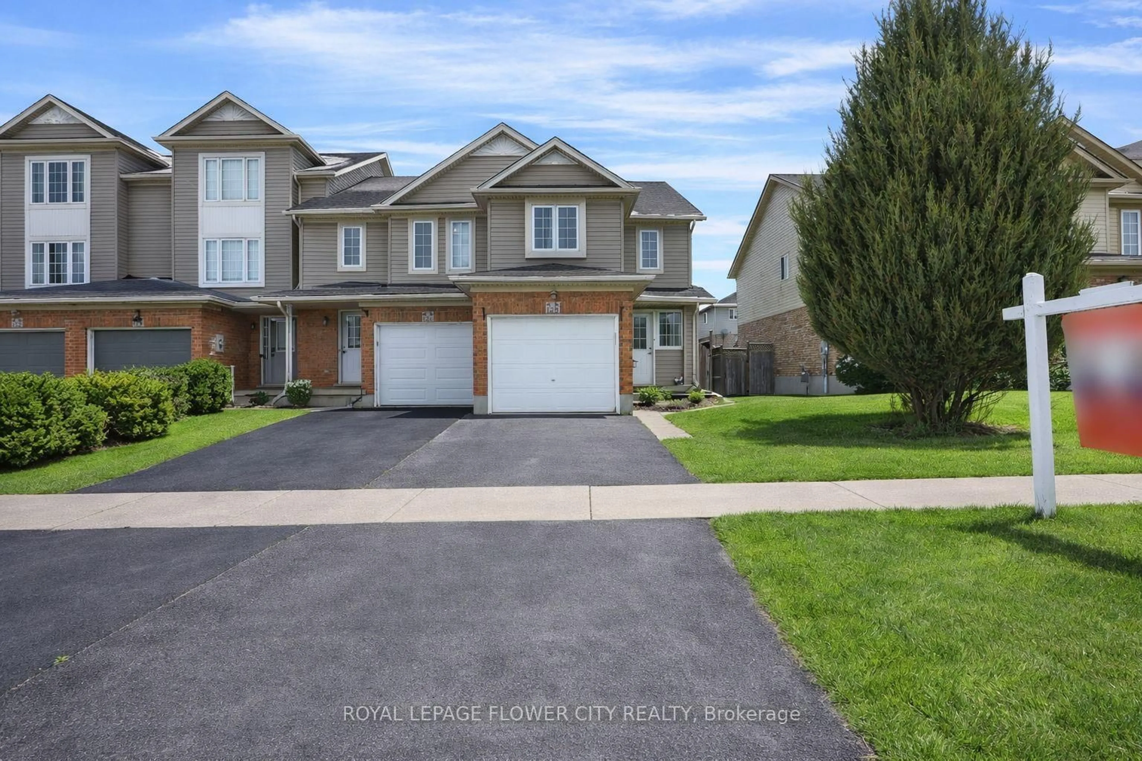 Home with vinyl exterior material, street for 128 Donnenwerth Dr, Kitchener Ontario N2E 4C8