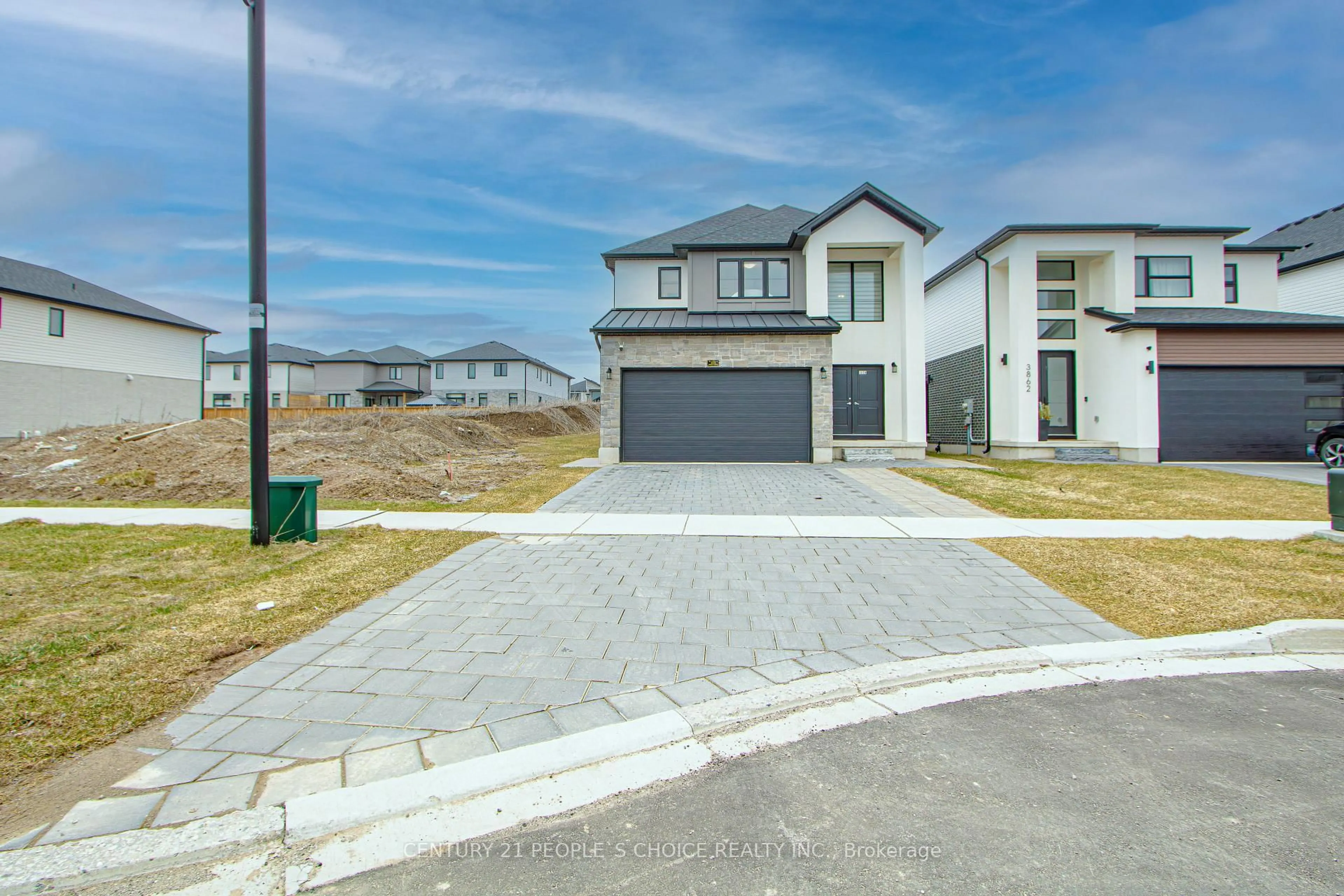 A pic from outside/outdoor area/front of a property/back of a property/a pic from drone, street for 3858 Campbell St, London South Ontario N6P 0J5