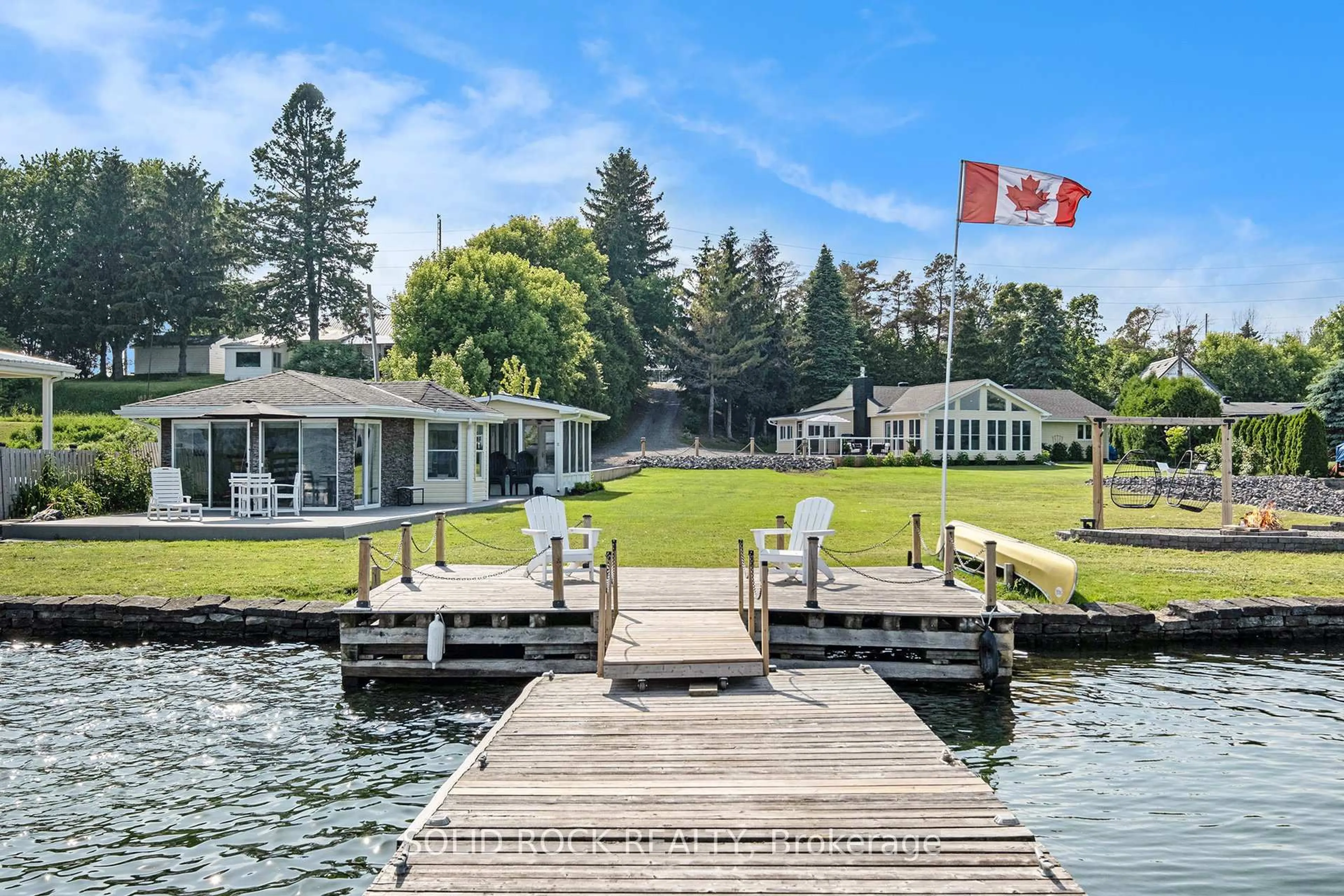 A pic from outside/outdoor area/front of a property/back of a property/a pic from drone, water/lake/river/ocean view for 1637 County Rd 2 Rd, Edwardsburgh/Cardinal Ontario K0E 1T0