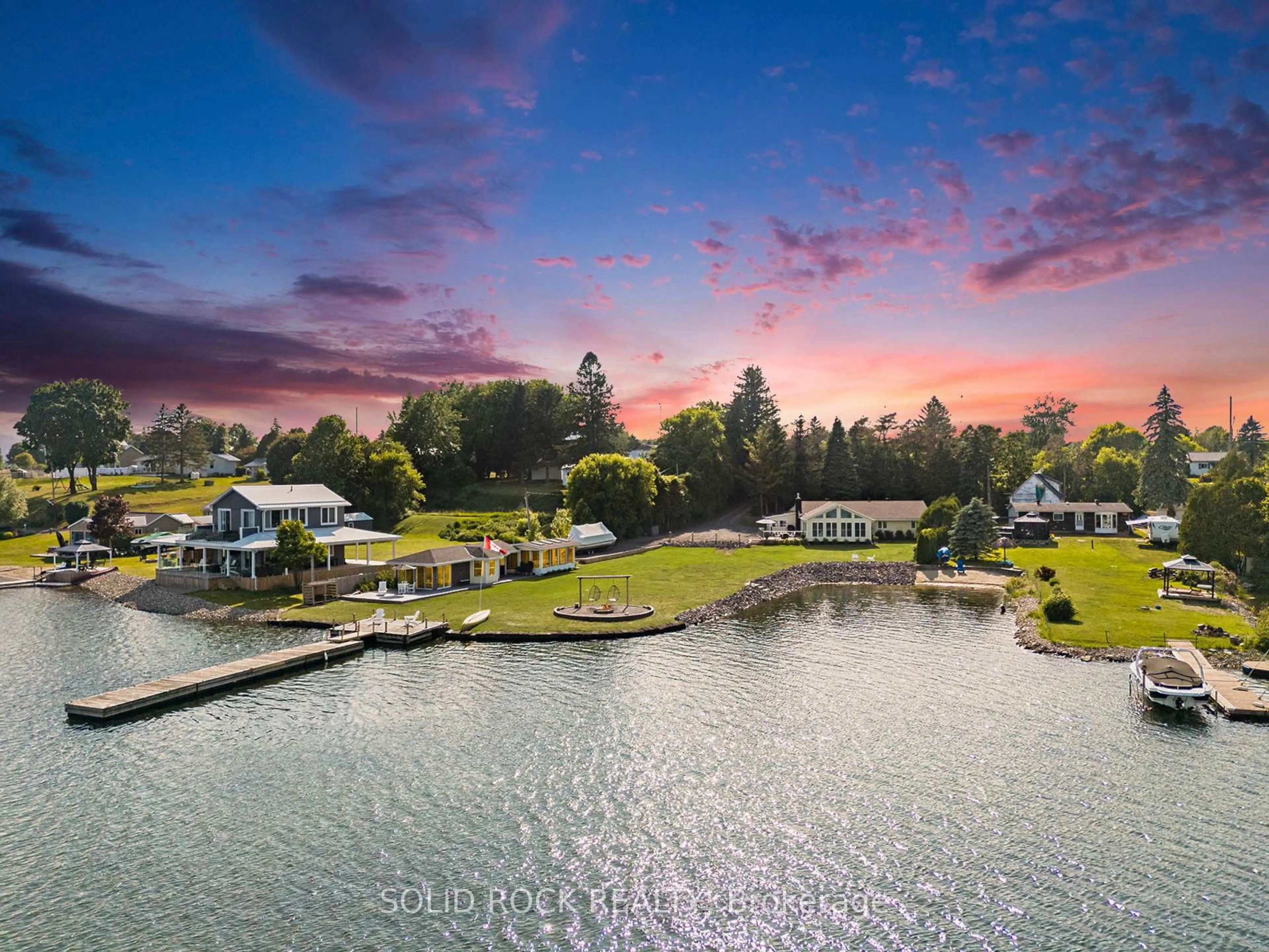 A pic from outside/outdoor area/front of a property/back of a property/a pic from drone, water/lake/river/ocean view for 1637 County Rd 2 Rd, Edwardsburgh/Cardinal Ontario K0E 1T0