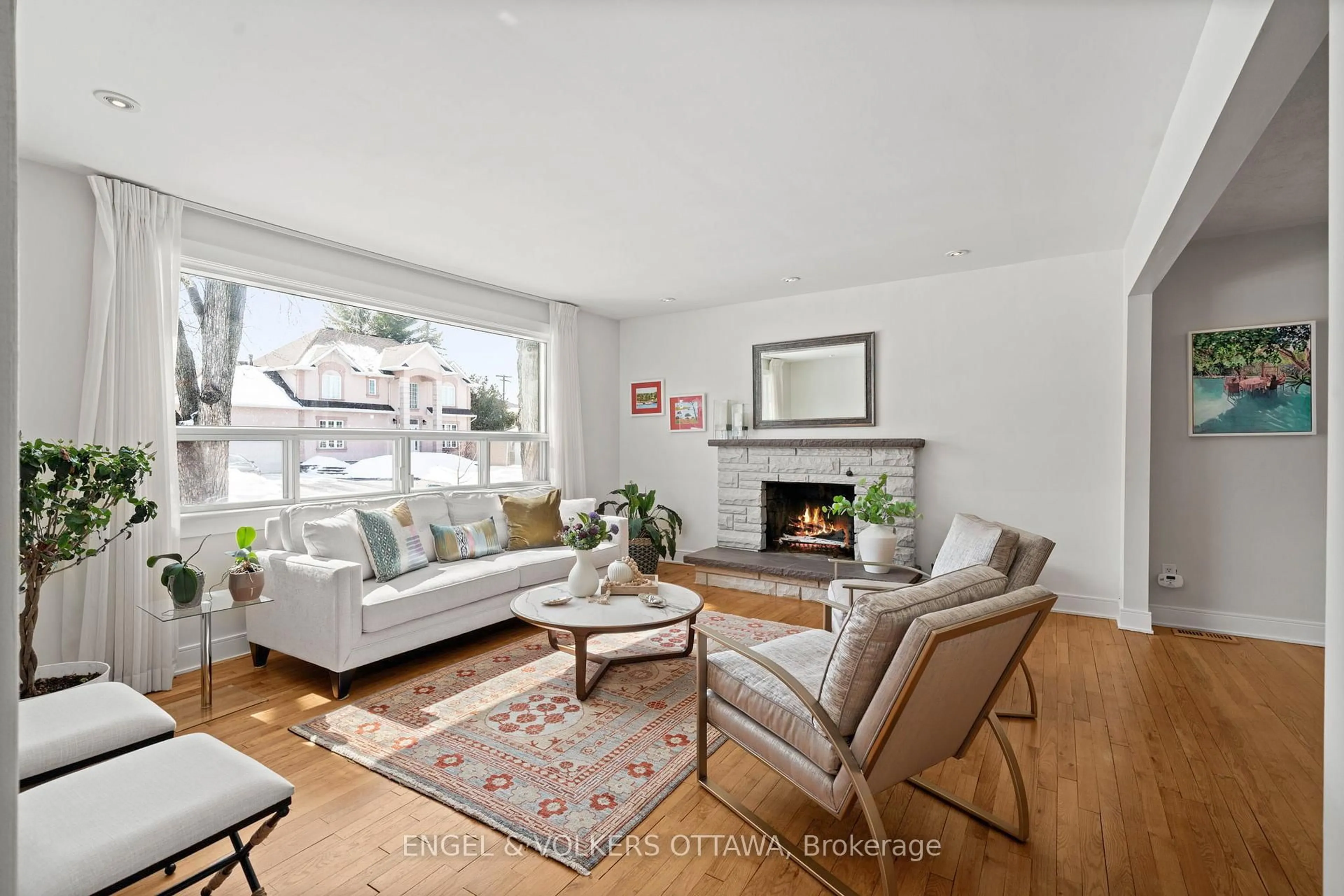 Living room with furniture, wood/laminate floor for 315 Frost Ave, Ottawa Ontario K1H 5J1