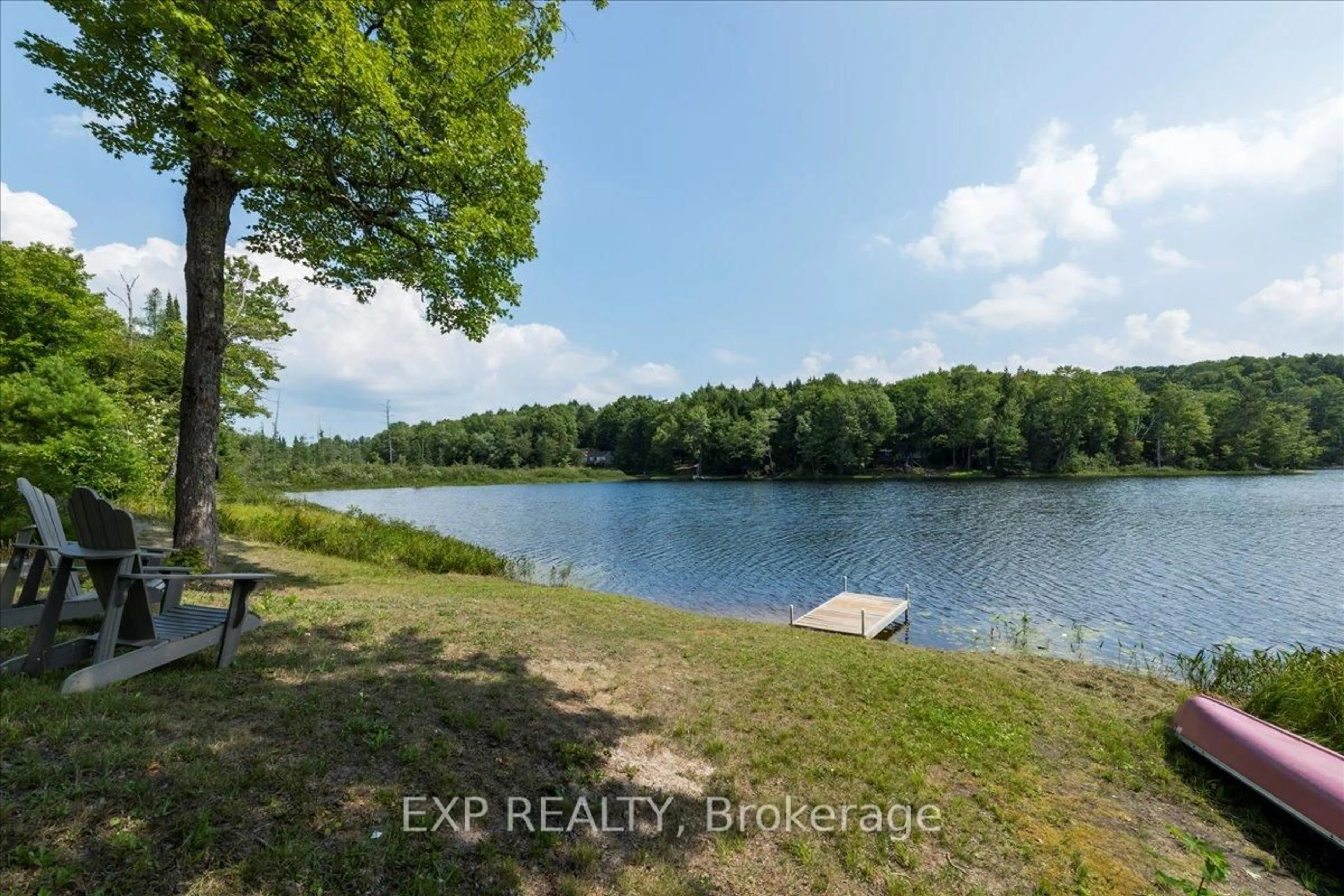A pic from outside/outdoor area/front of a property/back of a property/a pic from drone, water/lake/river/ocean view for 1867 Fraserburg Rd, Bracebridge Ontario P1L 1X3