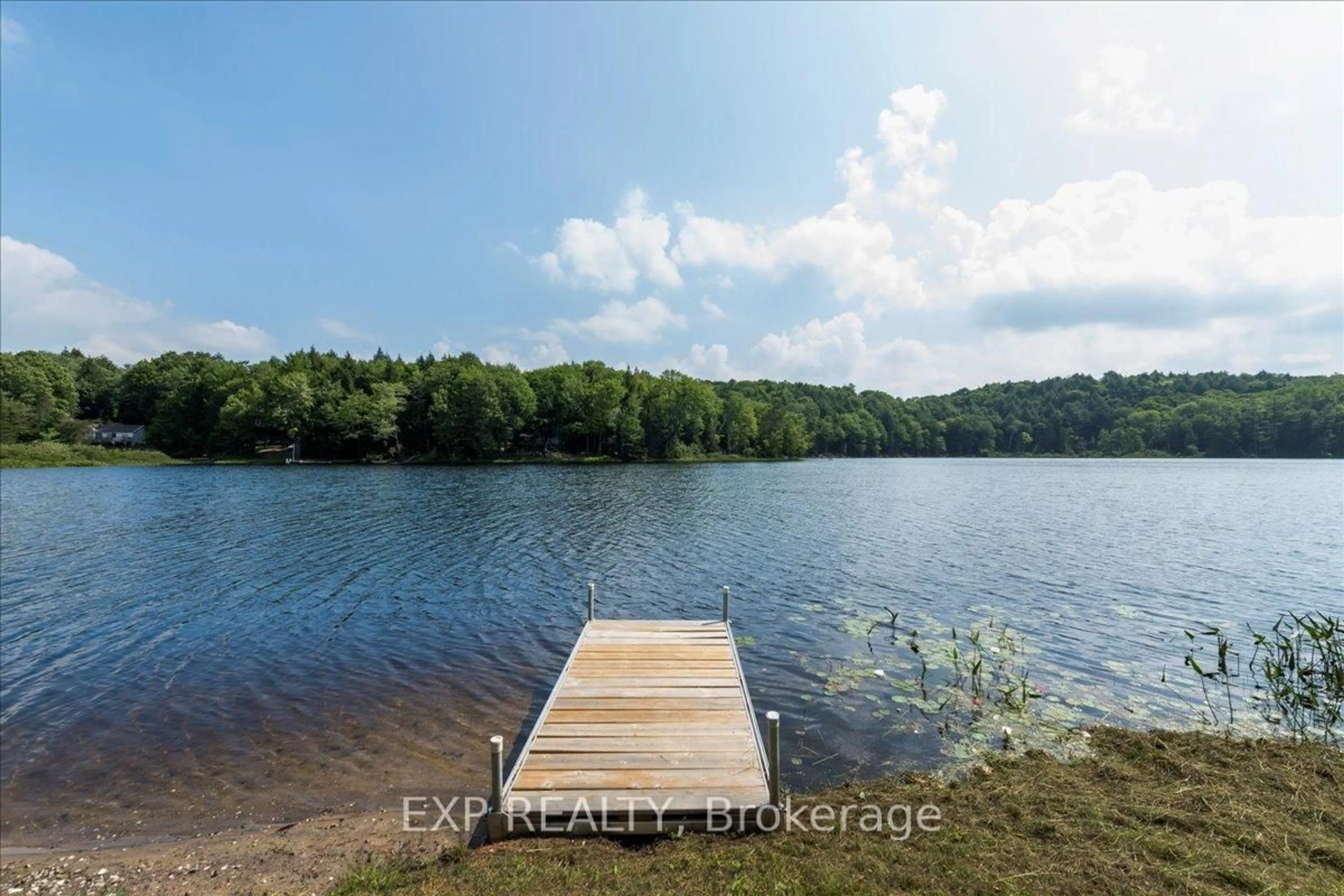 A pic from outside/outdoor area/front of a property/back of a property/a pic from drone, water/lake/river/ocean view for 1867 Fraserburg Rd, Bracebridge Ontario P1L 1X3