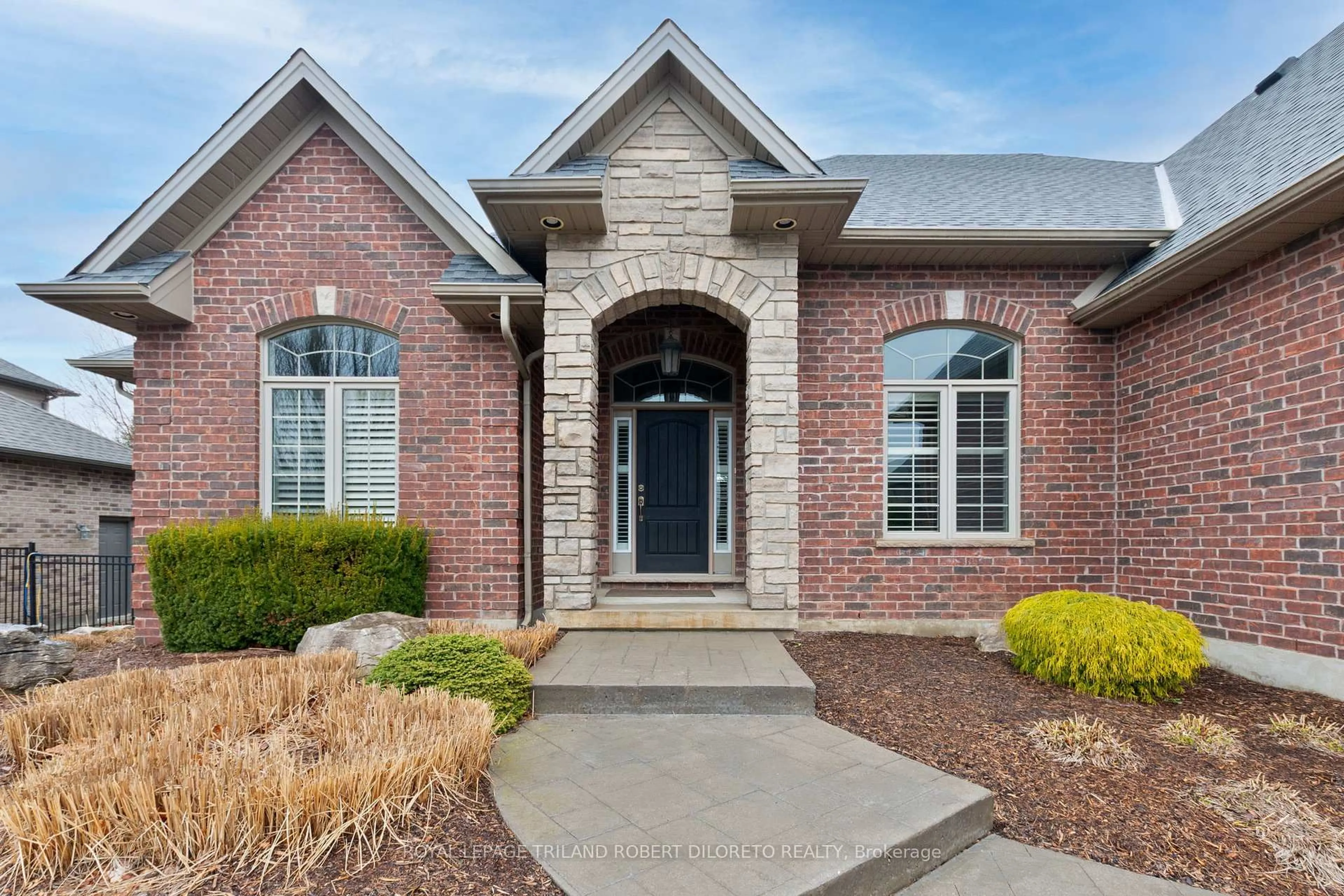 Home with brick exterior material, street for 6968 Clayton Walk, London South Ontario N6P 0B2