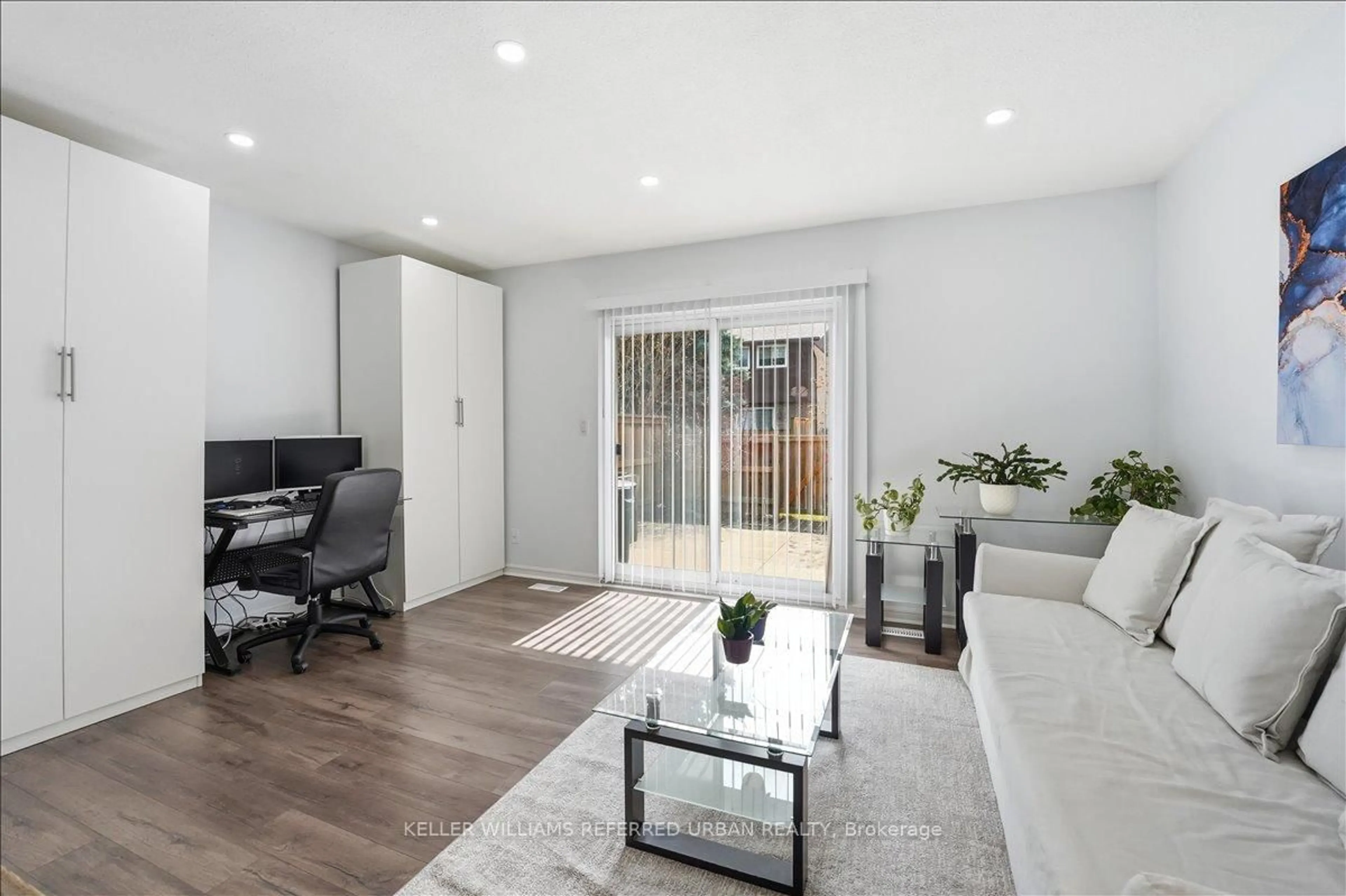 Living room with furniture, wood/laminate floor for 151 Linwell Rd #63, St. Catharines Ontario L2N 6P3