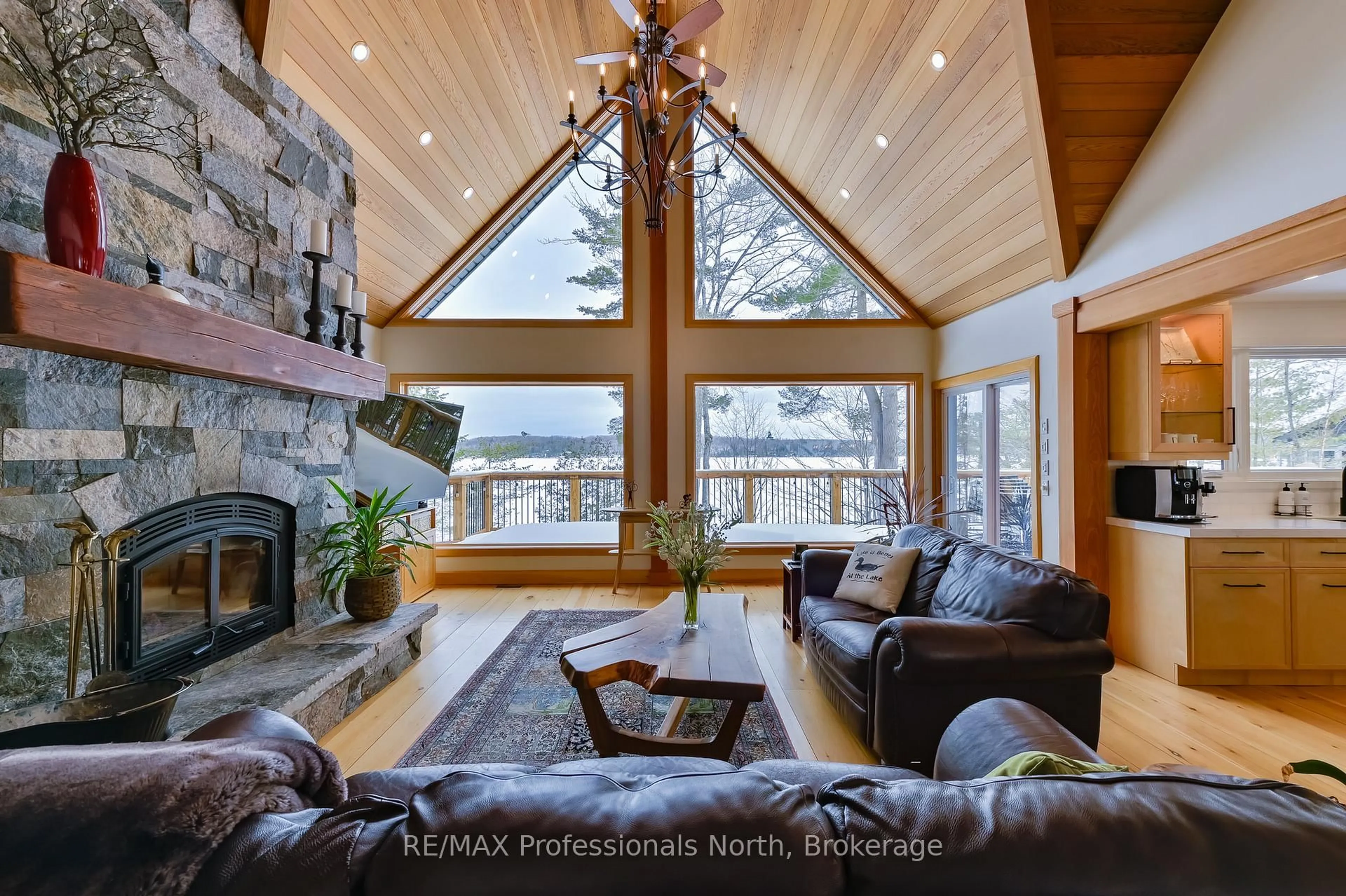 Living room with furniture, wood/laminate floor for 1015 Bluestone Lane, Minden Hills Ontario K0M 2K0