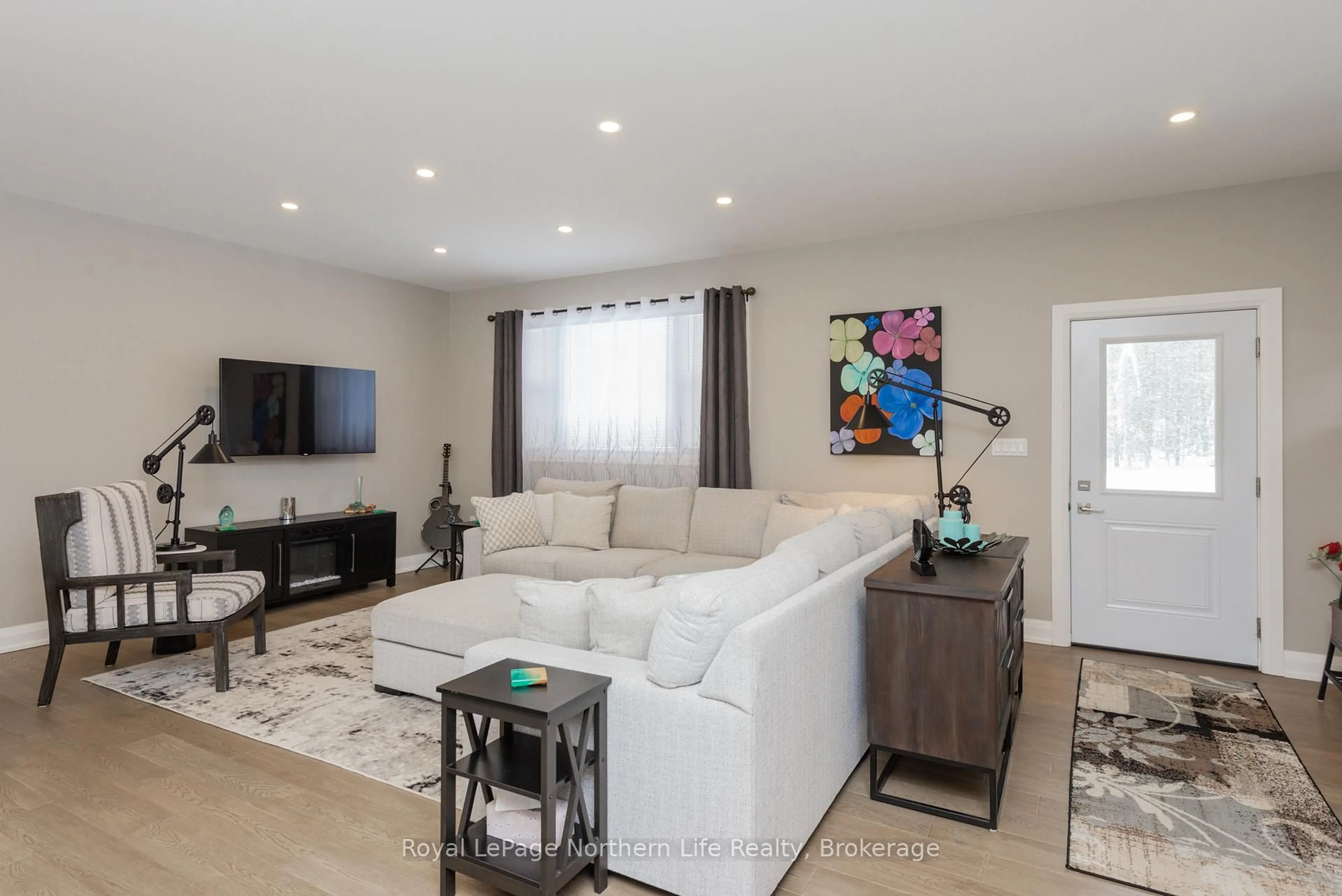 Living room with furniture, unknown for 106 Riverside Dr, Bonfield Ontario P0H 1E0