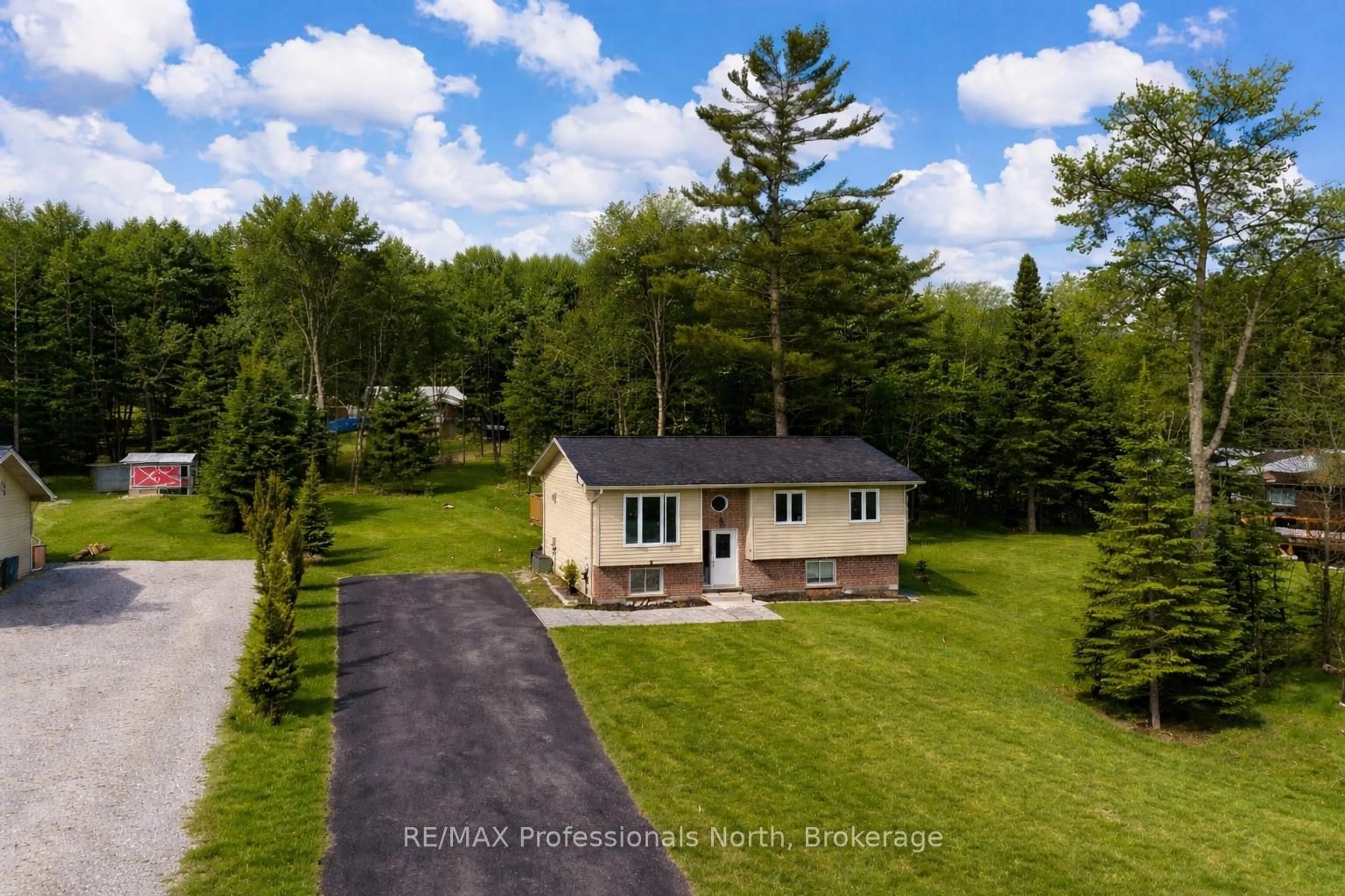 A pic from outside/outdoor area/front of a property/back of a property/a pic from drone, water/lake/river/ocean view for 1036 Post Rd, Bracebridge Ontario P1L 1W9