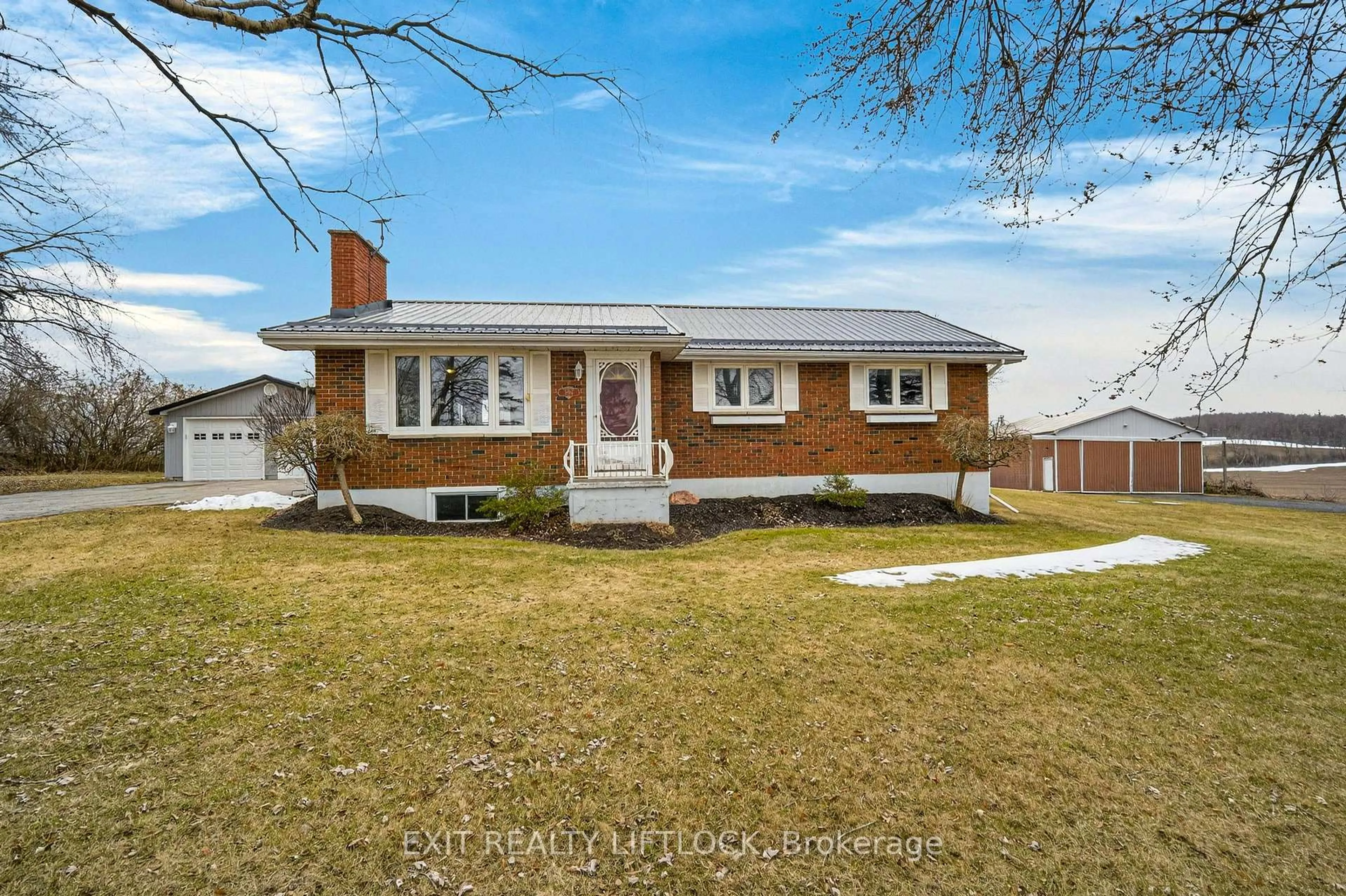 Home with brick exterior material, street for 2289 Base Line Rd, Otonabee-South Monaghan Ontario K9J 6X9