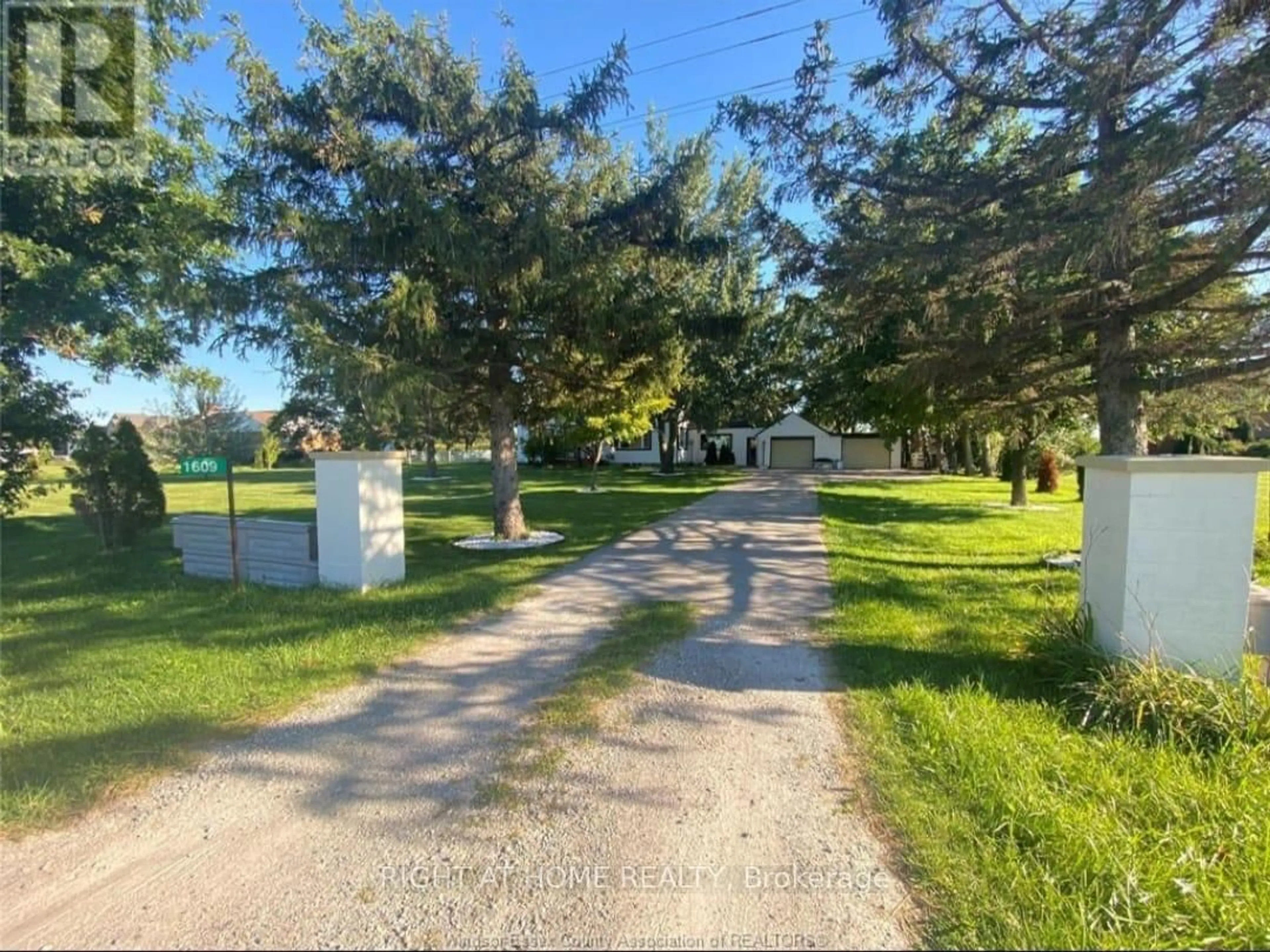 A pic from outside/outdoor area/front of a property/back of a property/a pic from drone, street for 1609 county Road 46 Rd, Lakeshore Ontario N0R 1V0