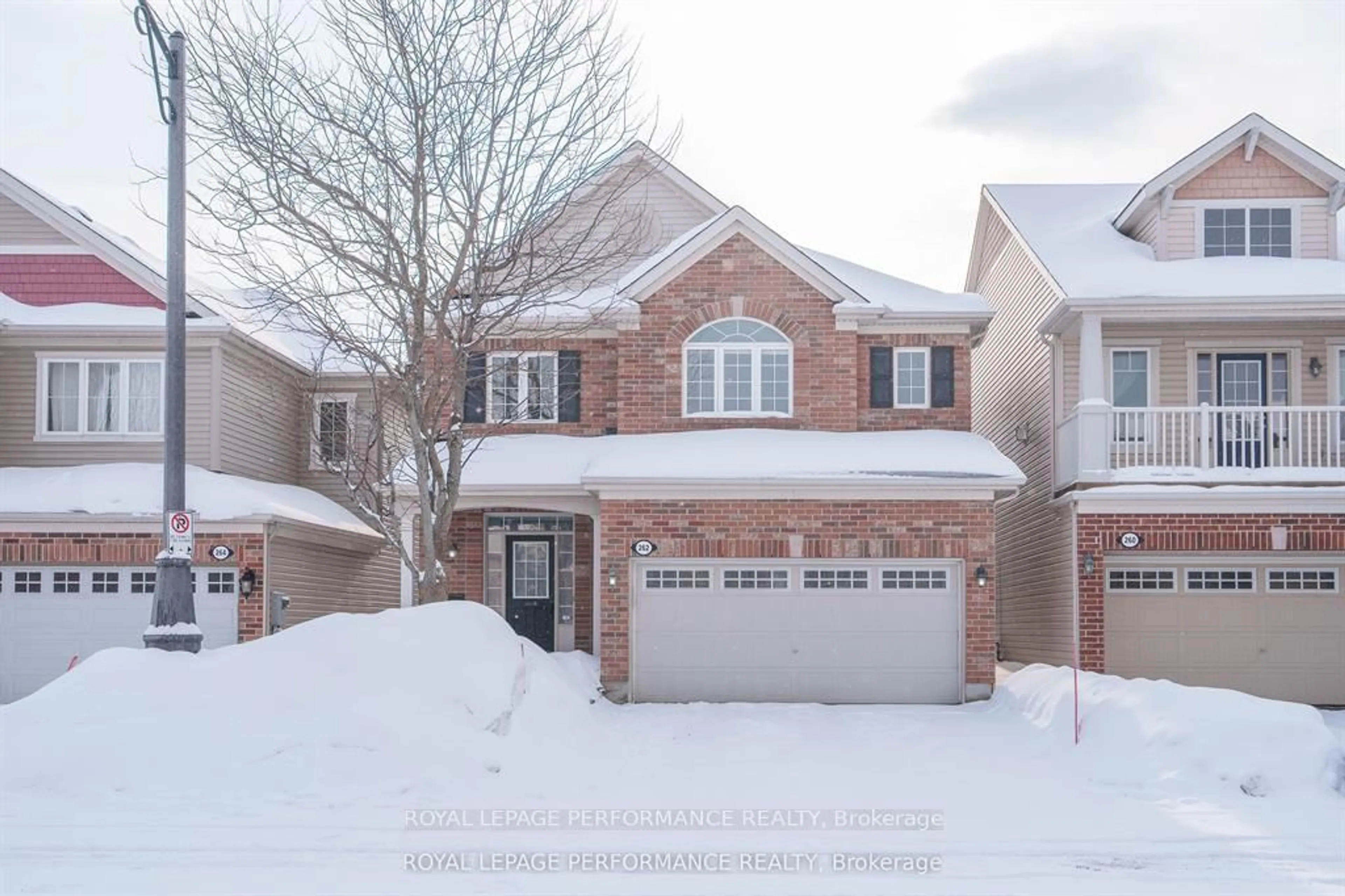 Home with brick exterior material, street for 262 Tempest Dr, Stittsville Ontario K2S 0K6