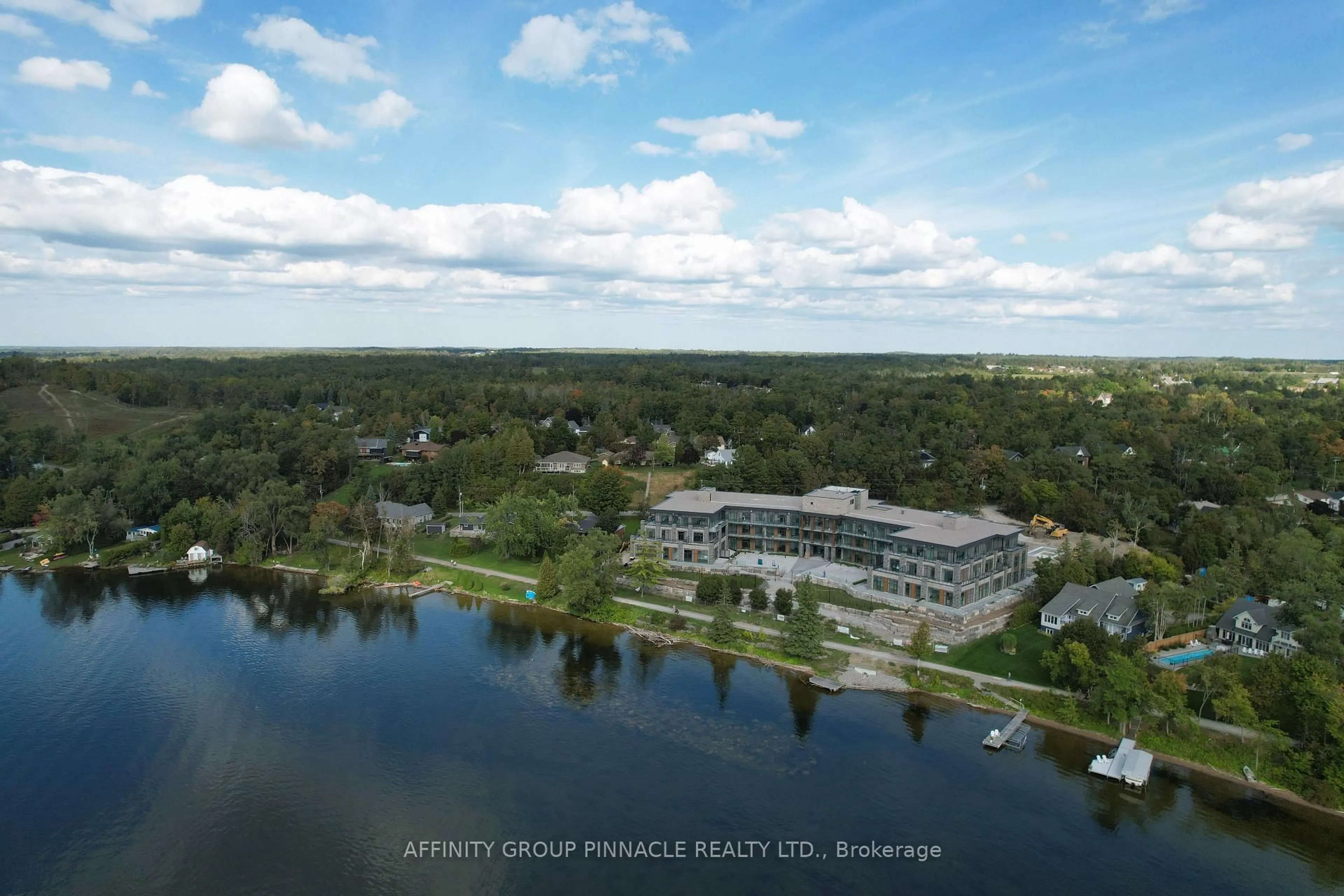 A pic from outside/outdoor area/front of a property/back of a property/a pic from drone, water/lake/river/ocean view for 99 Louisa St #309, Kawartha Lakes Ontario K0M 1N0